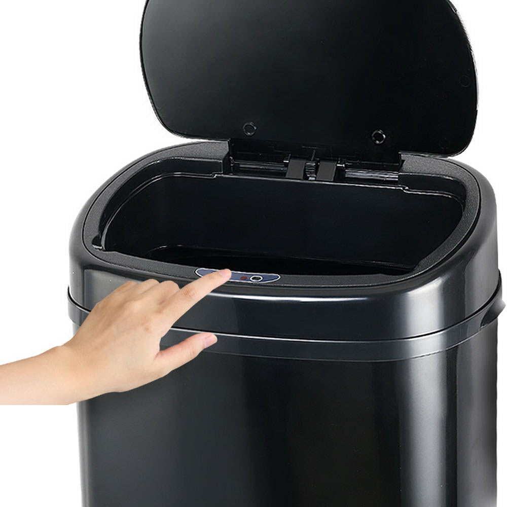 A sleek black 58L motion sensor rubbish bin made of fingerprint-resistant steel, showcasing its modern design and hands-free operation feature.