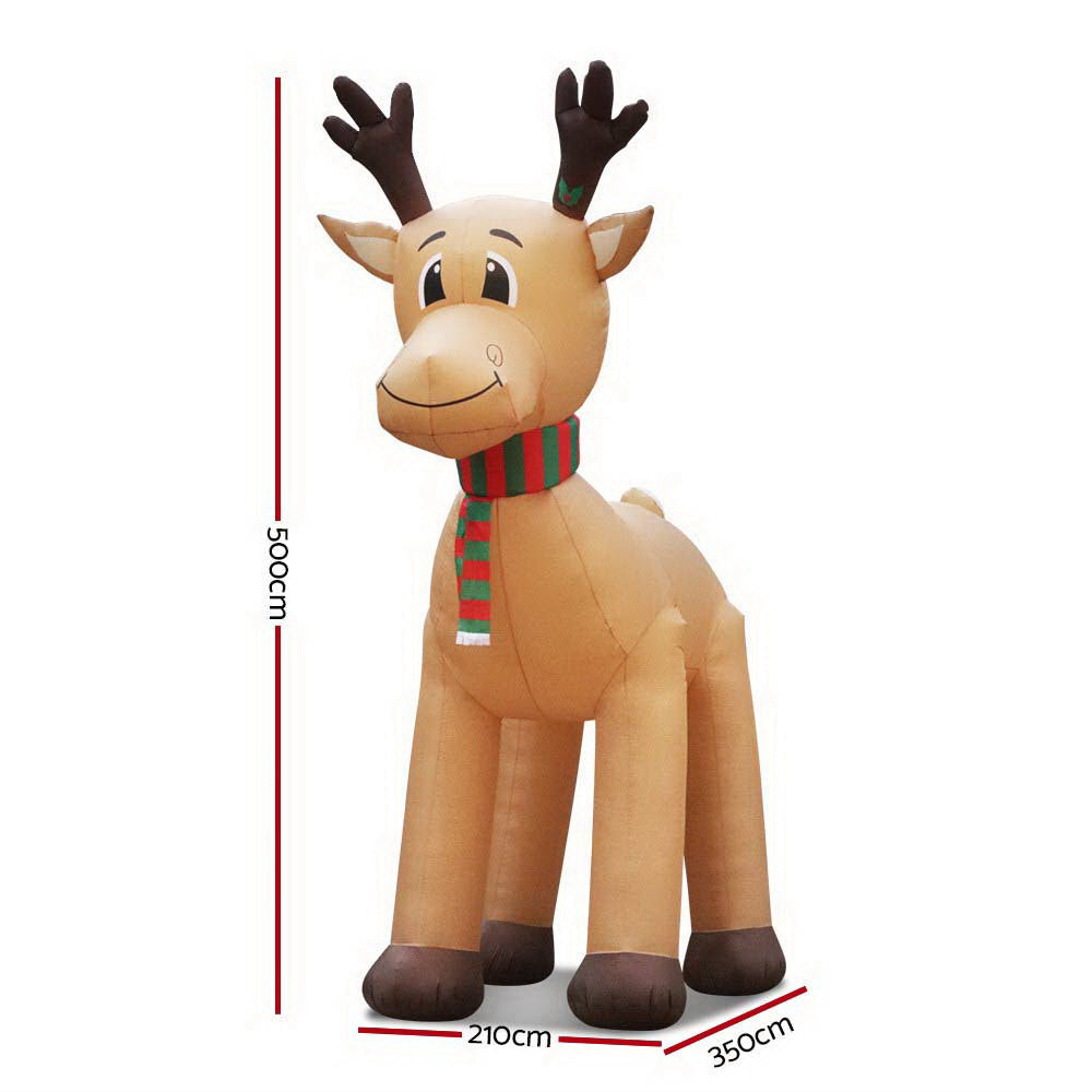 A 5-meter tall inflatable reindeer with a smiling face, illuminated by LED lights, set against a festive backdrop.