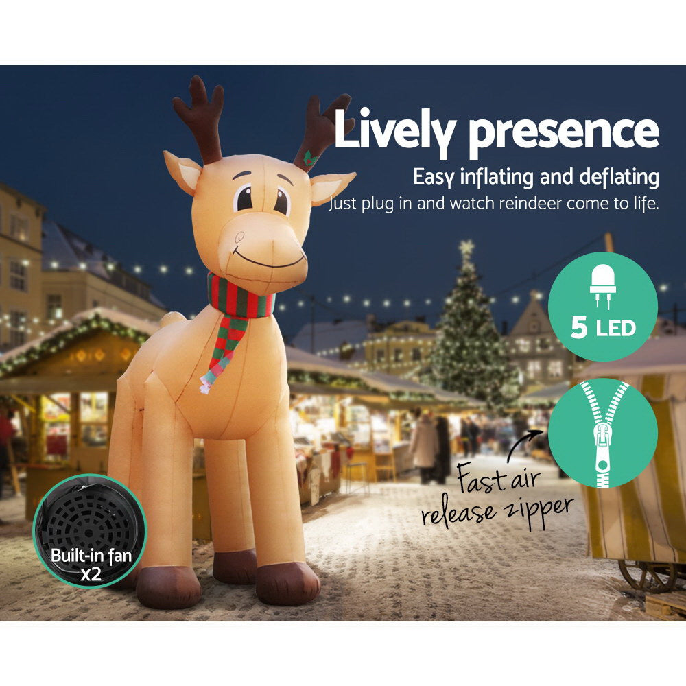 A 5-meter tall inflatable reindeer with a smiling face, illuminated by LED lights, set against a festive backdrop.