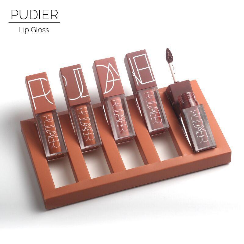 5pcs Pudaier Sexy Lipgloss set featuring vibrant pumpkin colors in sleek packaging, showcasing the variety of shades available.