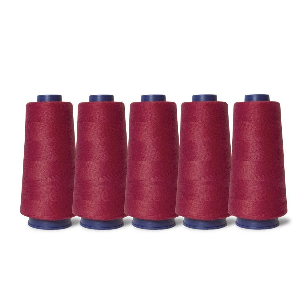 Five spools of hot pink sewing overlocker thread, each 2000m long, displayed together, showcasing their vibrant color and quality.