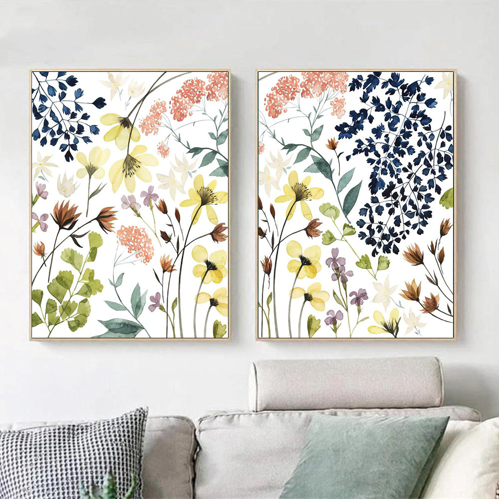 A beautifully framed 60cmx90cm canvas wall art featuring a vibrant flower composition in a gold frame, ready to hang.