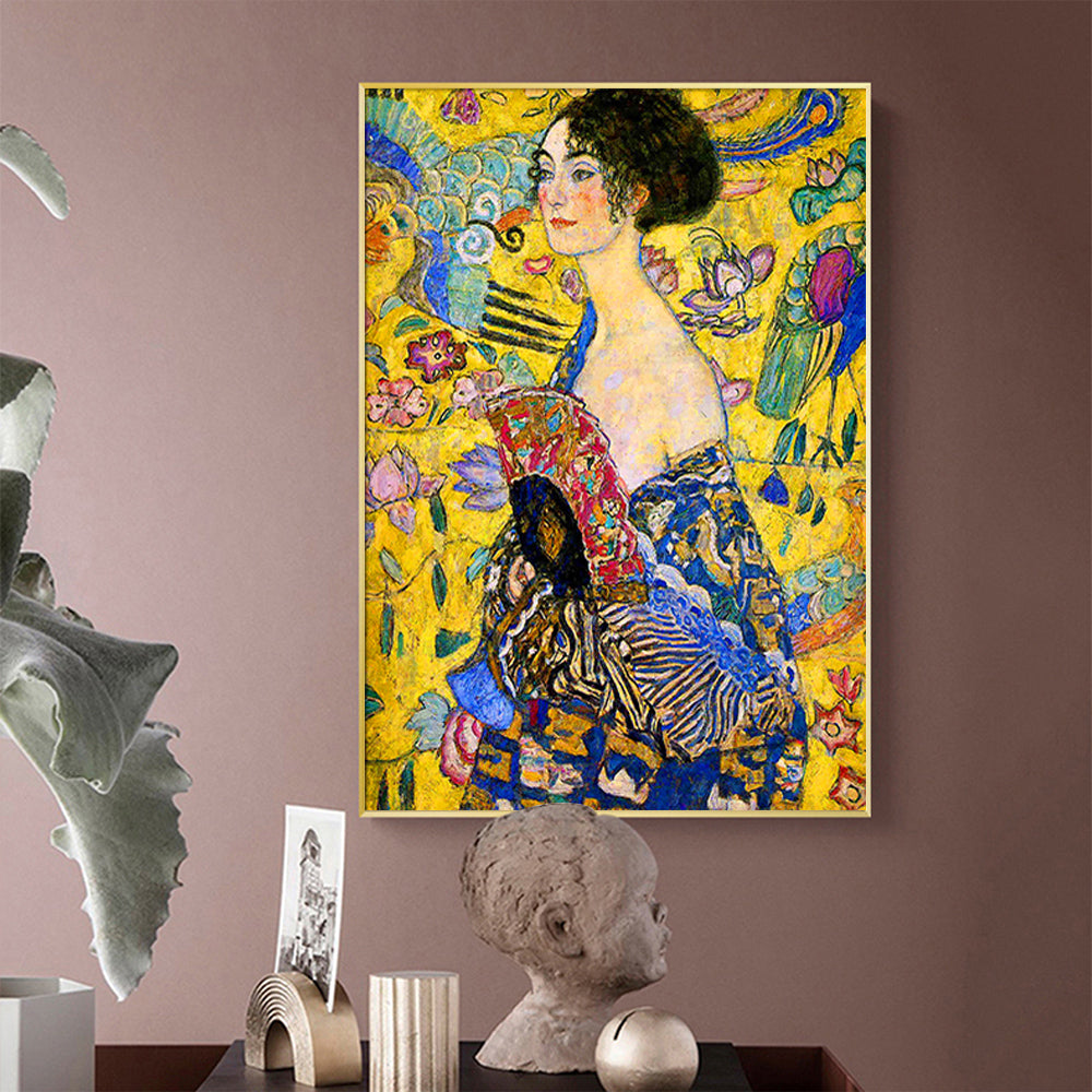 60cmx90cm canvas wall art featuring Klimt's Lady With A Fan, elegantly framed in gold, showcasing vibrant colors and intricate details.