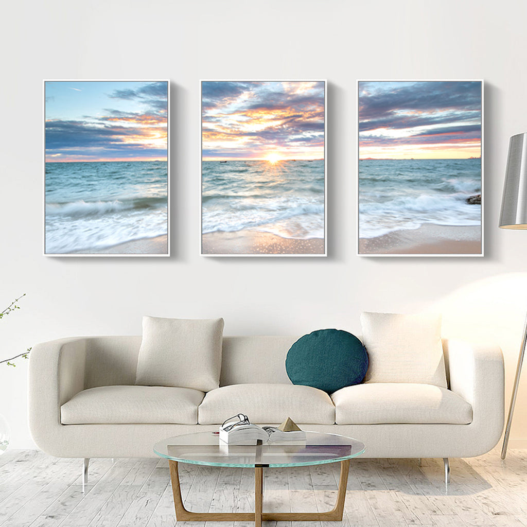 60cmx90cm canvas wall art featuring a serene sunrise over the ocean, framed in a stylish white floating frame.