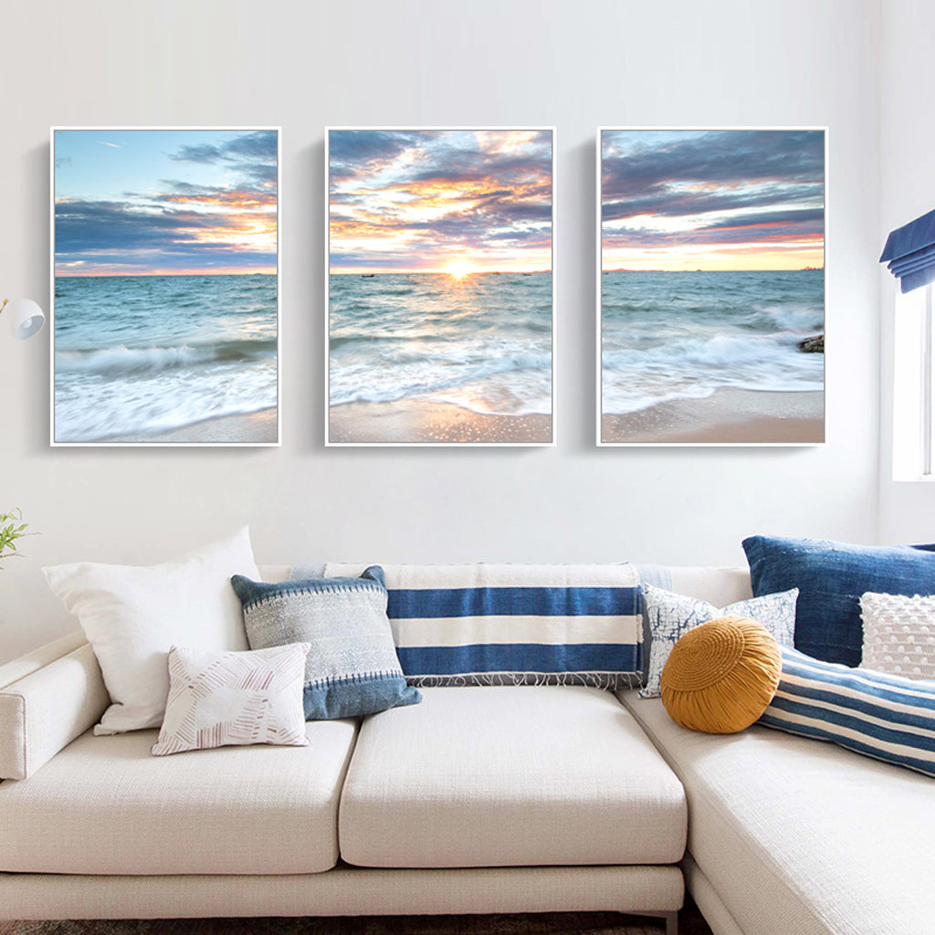 60cmx90cm canvas wall art featuring a serene sunrise over the ocean, framed in a stylish white floating frame.