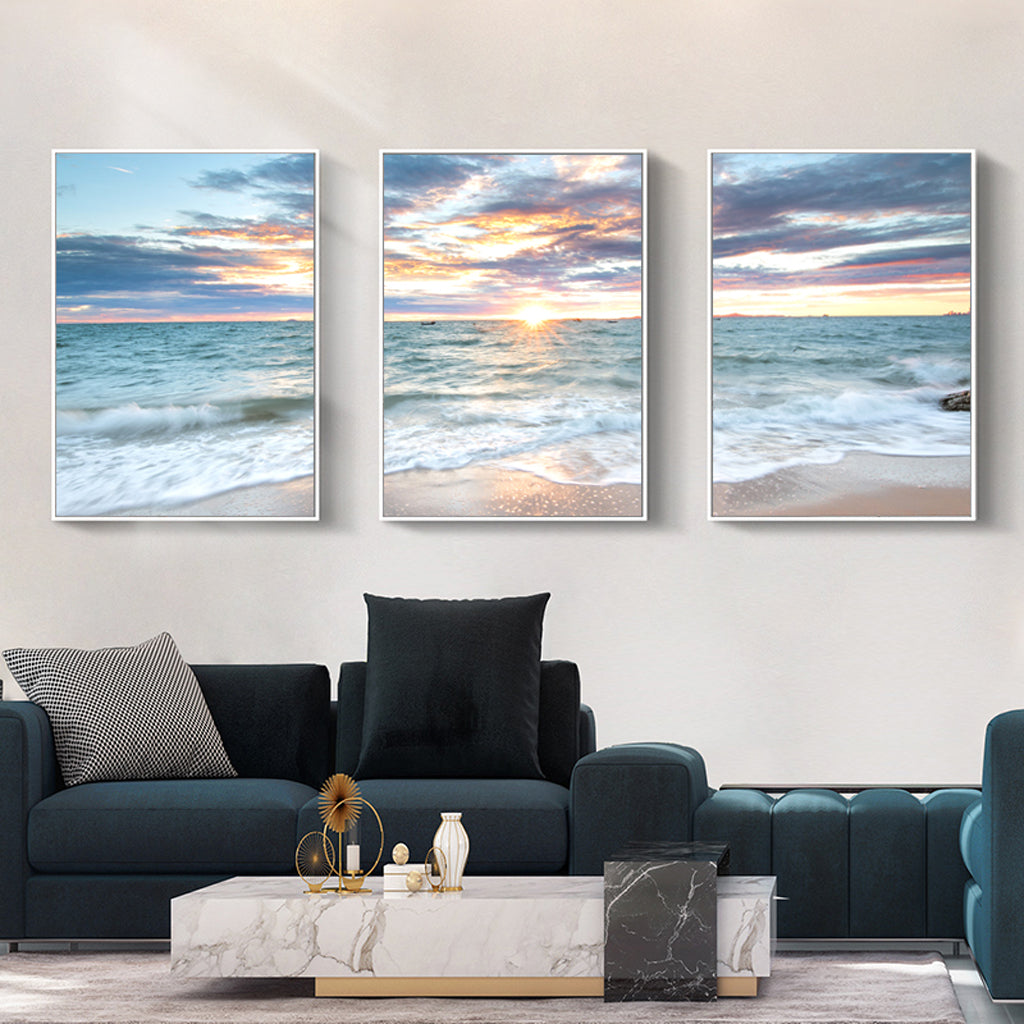 60cmx90cm canvas wall art featuring a serene sunrise over the ocean, framed in a stylish white floating frame.