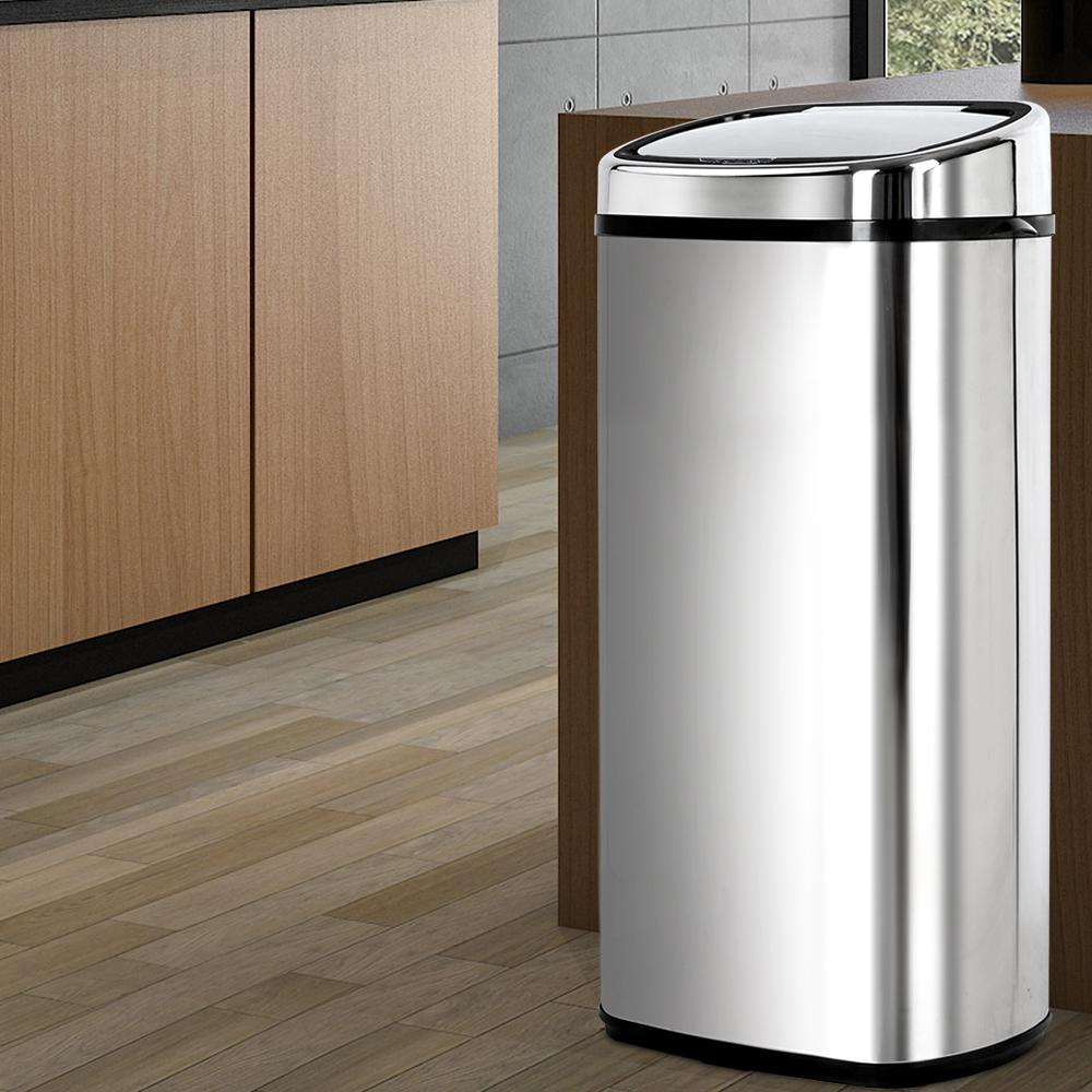 A sleek 68L stainless steel motion sensor rubbish bin with a hands-free lid, designed for modern kitchens.