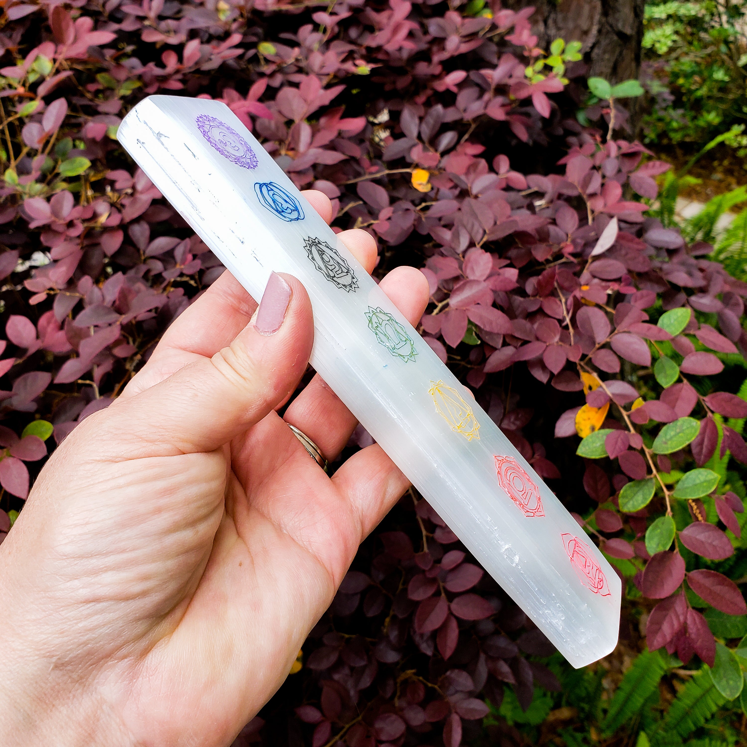 7 Chakras Color Laser Engraved Selenite Bar with vibrant chakra symbols for crystal cleansing and chakra balancing.