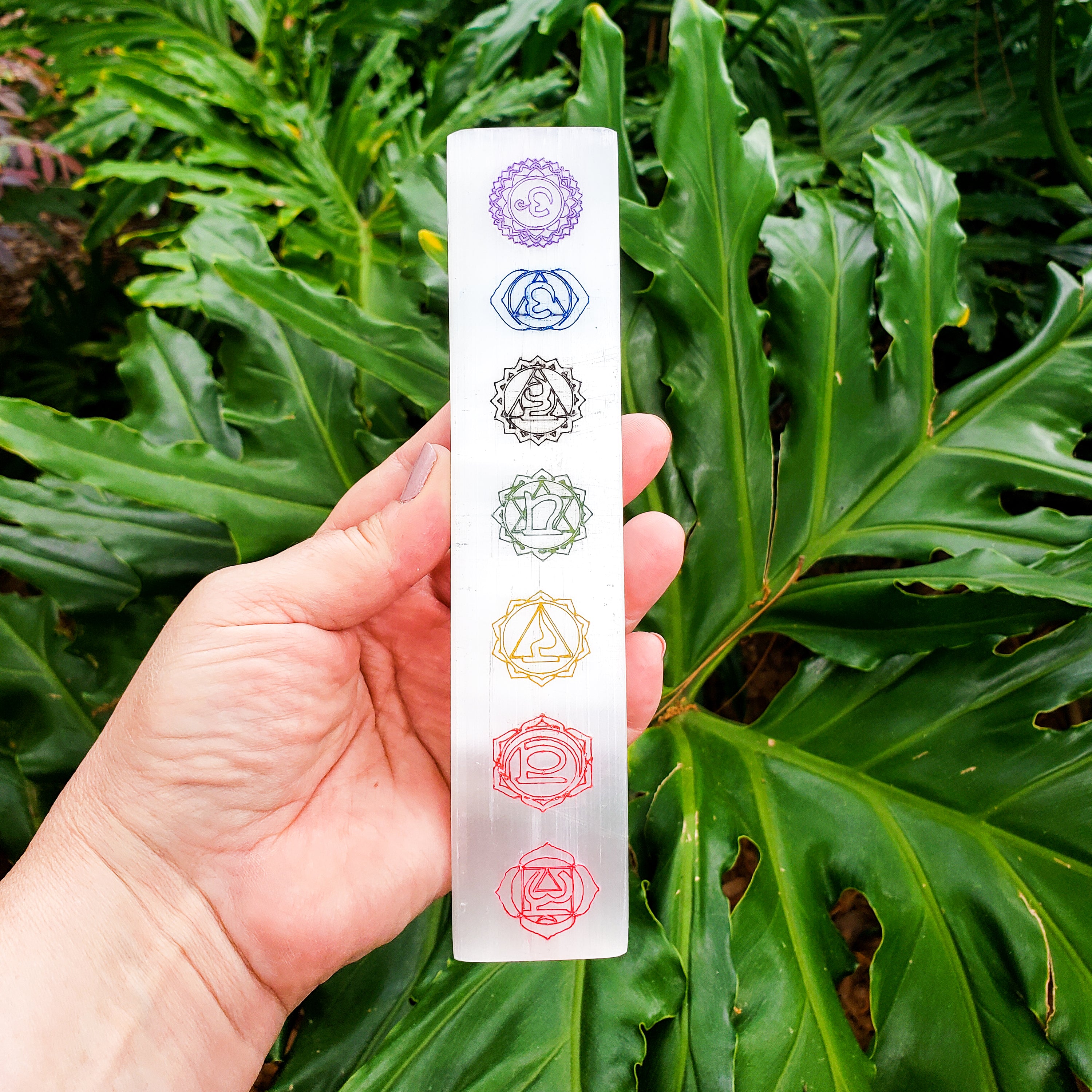 7 Chakras Color Laser Engraved Selenite Bar with vibrant chakra symbols for crystal cleansing and chakra balancing.