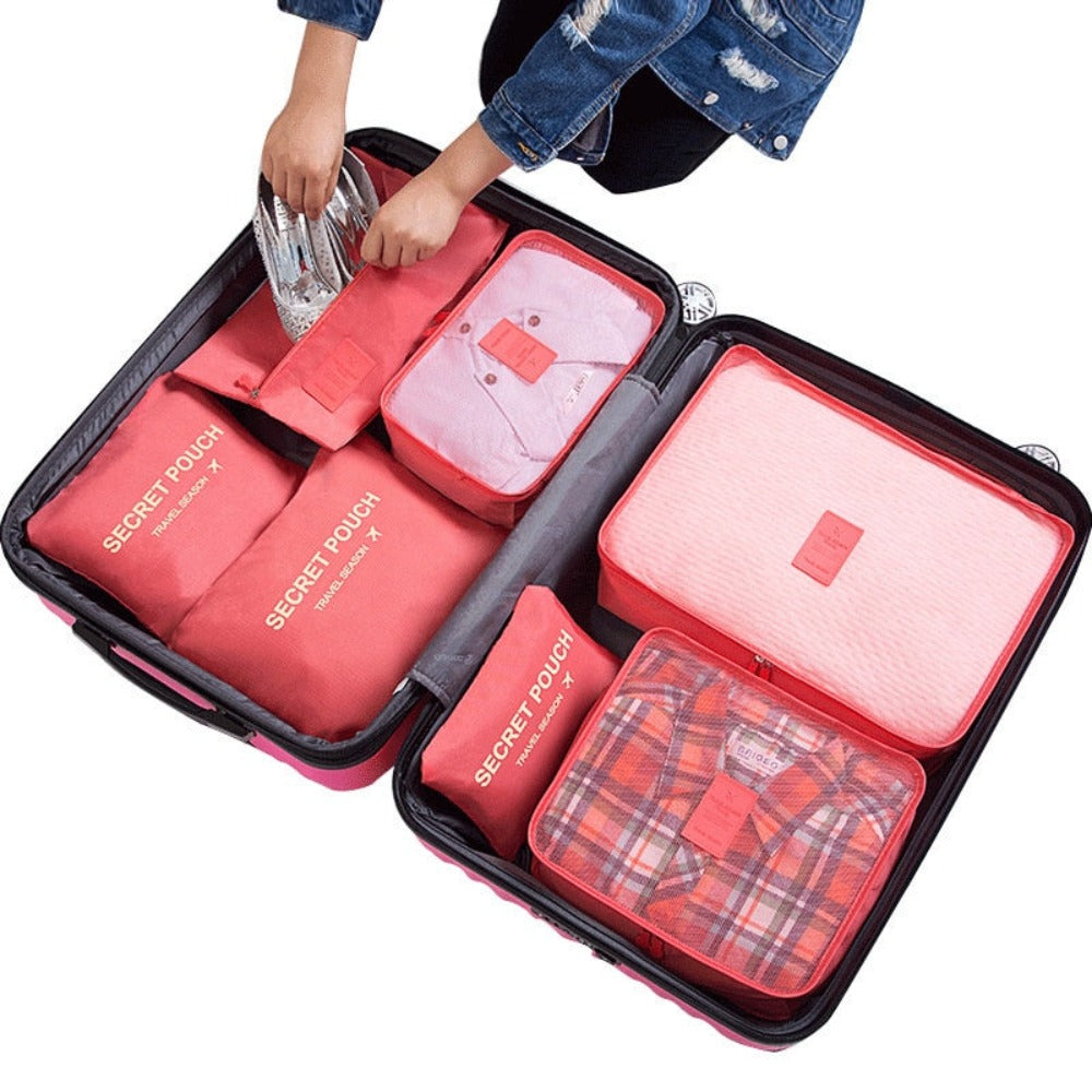 7 pcs Suitcase Organizer Bags Set made of durable Oxford fabric, featuring various sizes for organized travel storage.