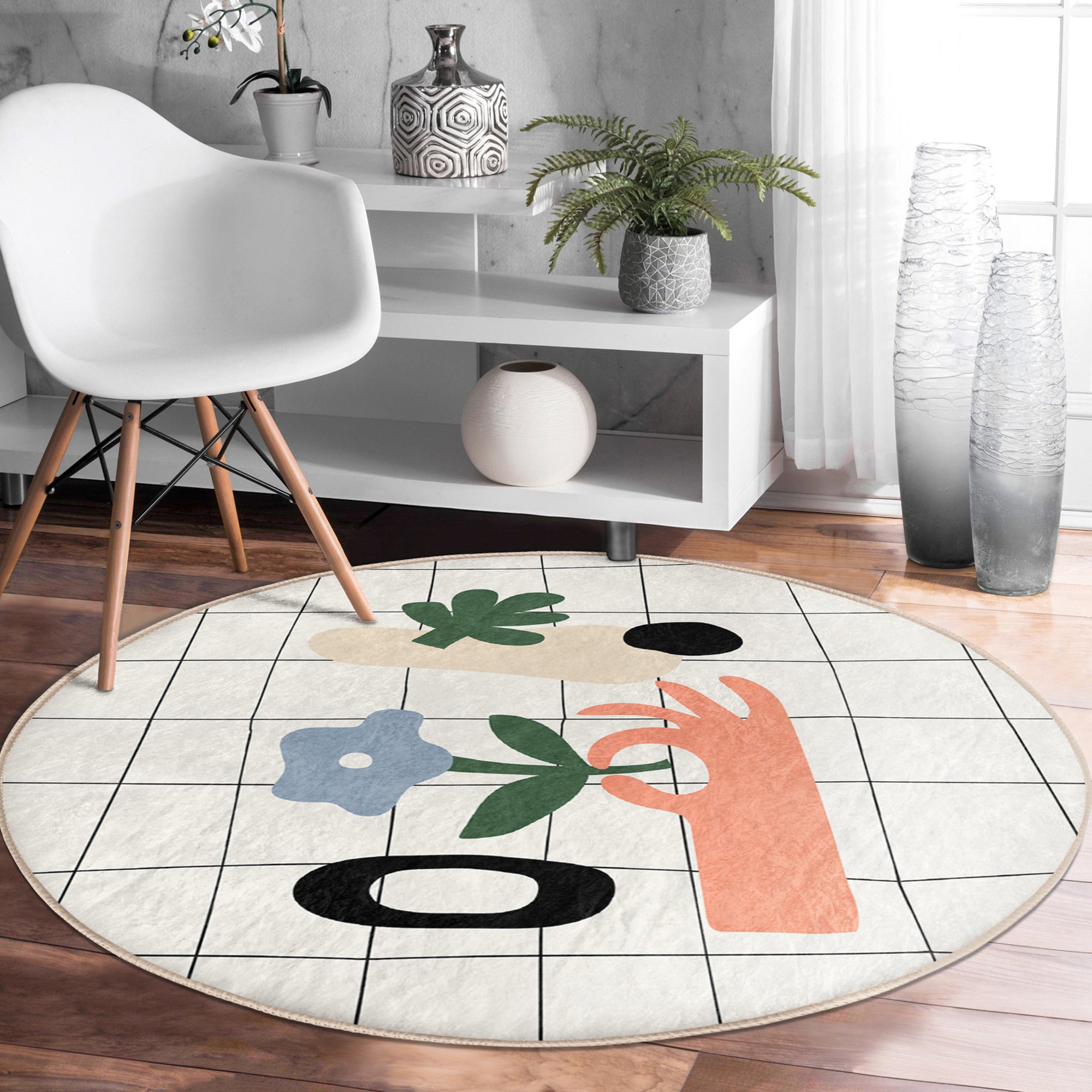 A beautifully designed abstract area rug in round shape, showcasing vibrant colors and soft velvet texture, perfect for home decor.