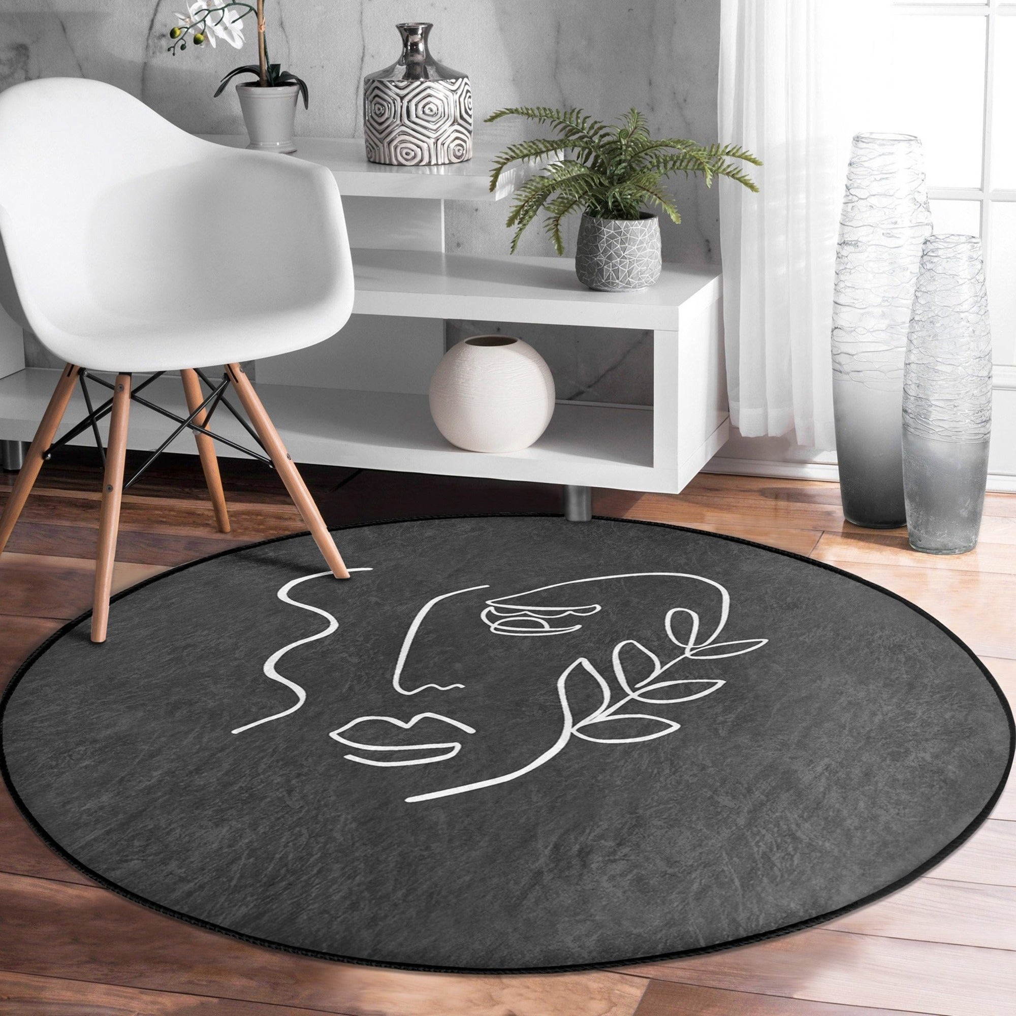 Abstract Face Patterned Round Rug in vibrant colors, showcasing a unique design and soft velvet texture, ideal for modern home decor.