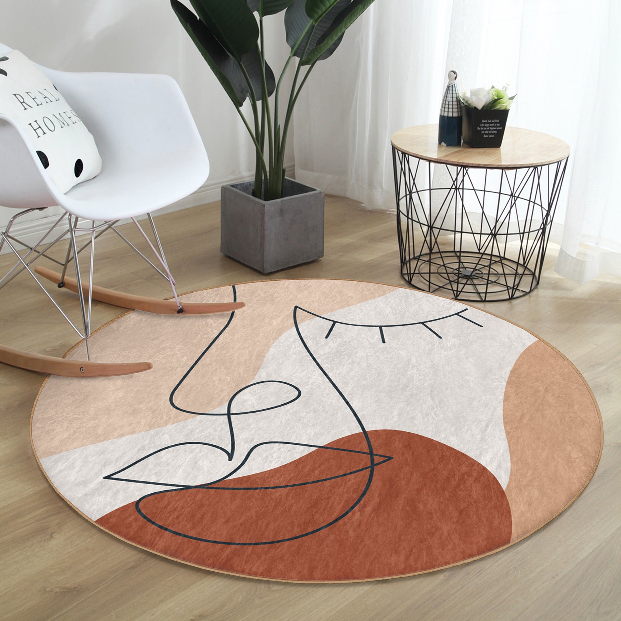 Abstract Face Patterned Round Rug in vibrant colors, showcasing a unique design and soft velvet texture, perfect for modern interiors.