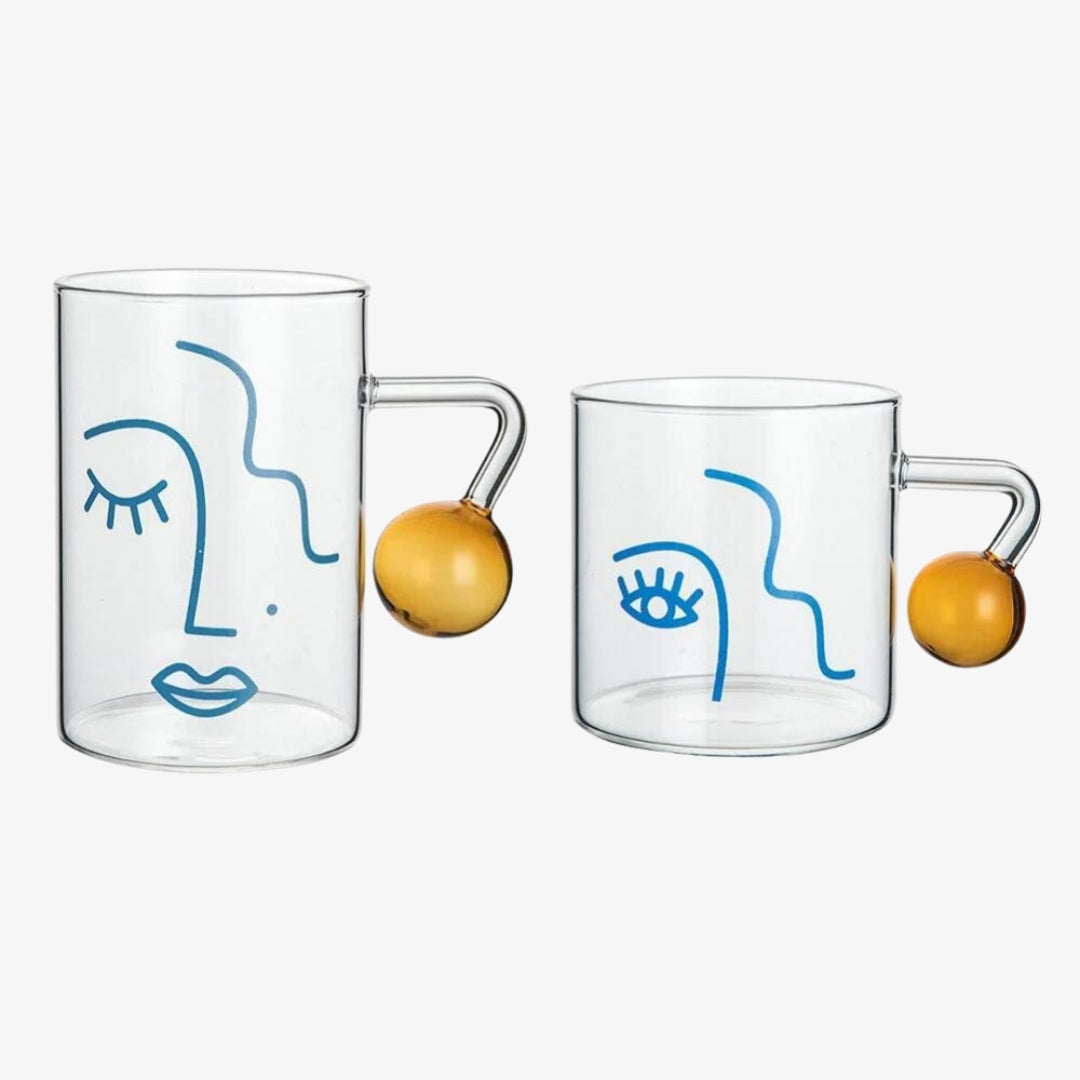 A stylish Abstract Glass Mug with unique artistic patterns, perfect for enjoying beverages.