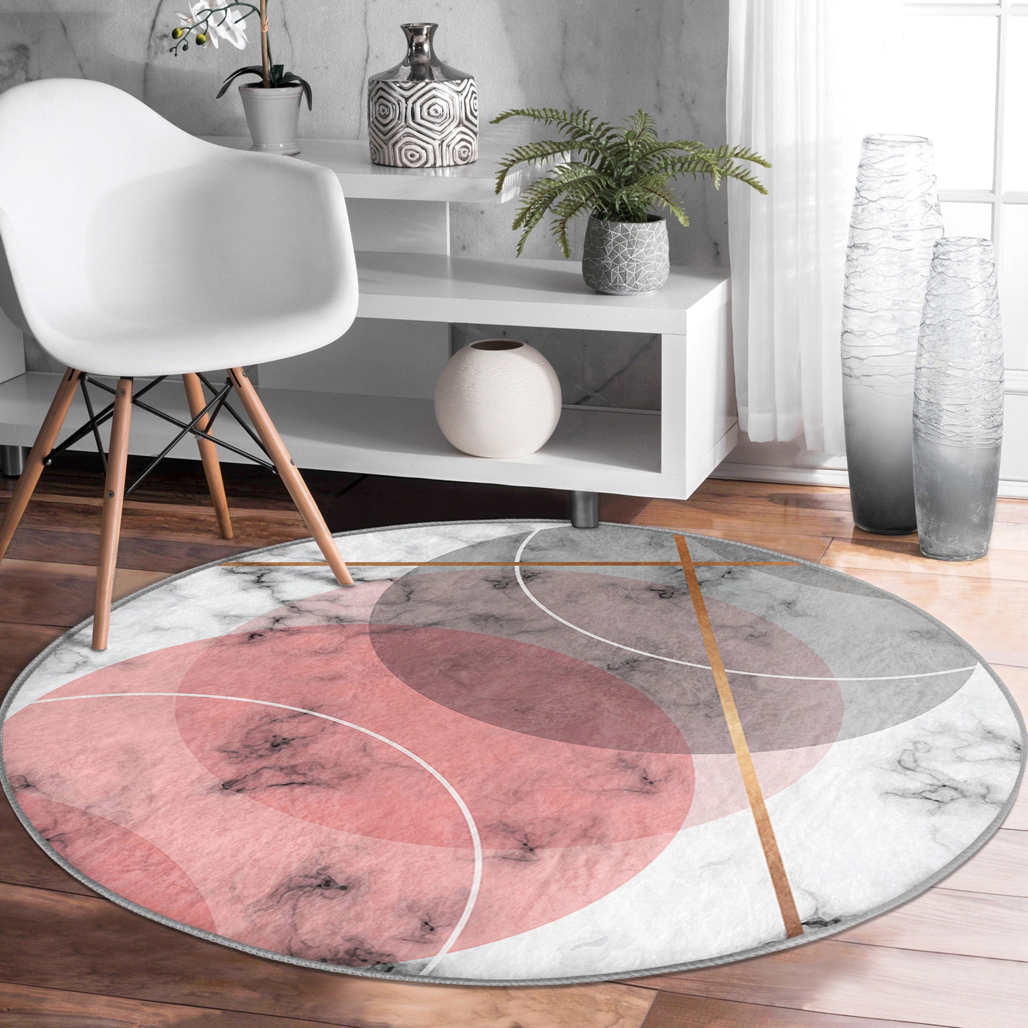 A stylish abstract pink circle rug designed for living rooms, showcasing a modern pattern and soft velvet texture.