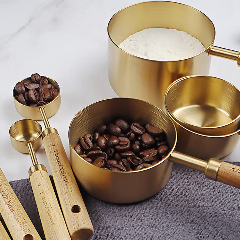 Acacia Wooden Handle Stainless Steel Measuring Cup and Spoon set showcasing elegant design and durable materials.