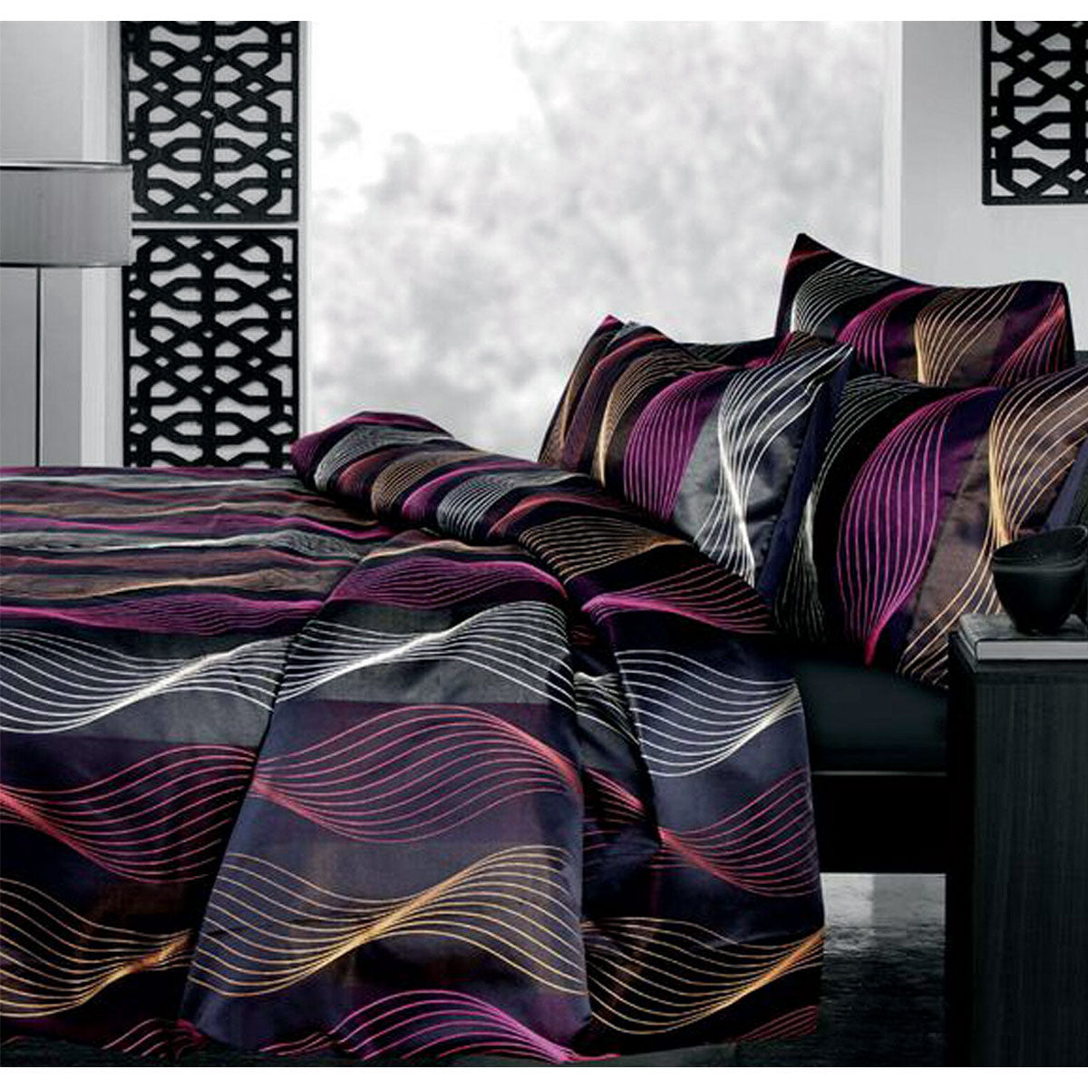 Accessorize Airwave Multi Jacquard Quilt Cover Set Single featuring vibrant wave lines in black, yellow, orange, and red on soft polyester fabric.