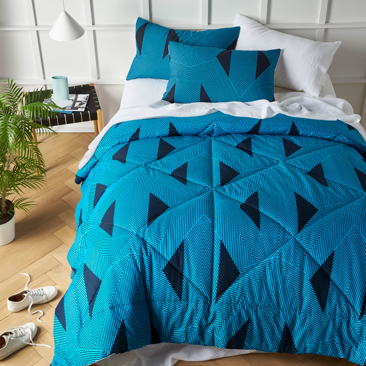 Accessorize Aster Washed Cotton Comforter Set King featuring a quilted geometric design in blue and black tones, with a soft cotton cover and polyester filling.