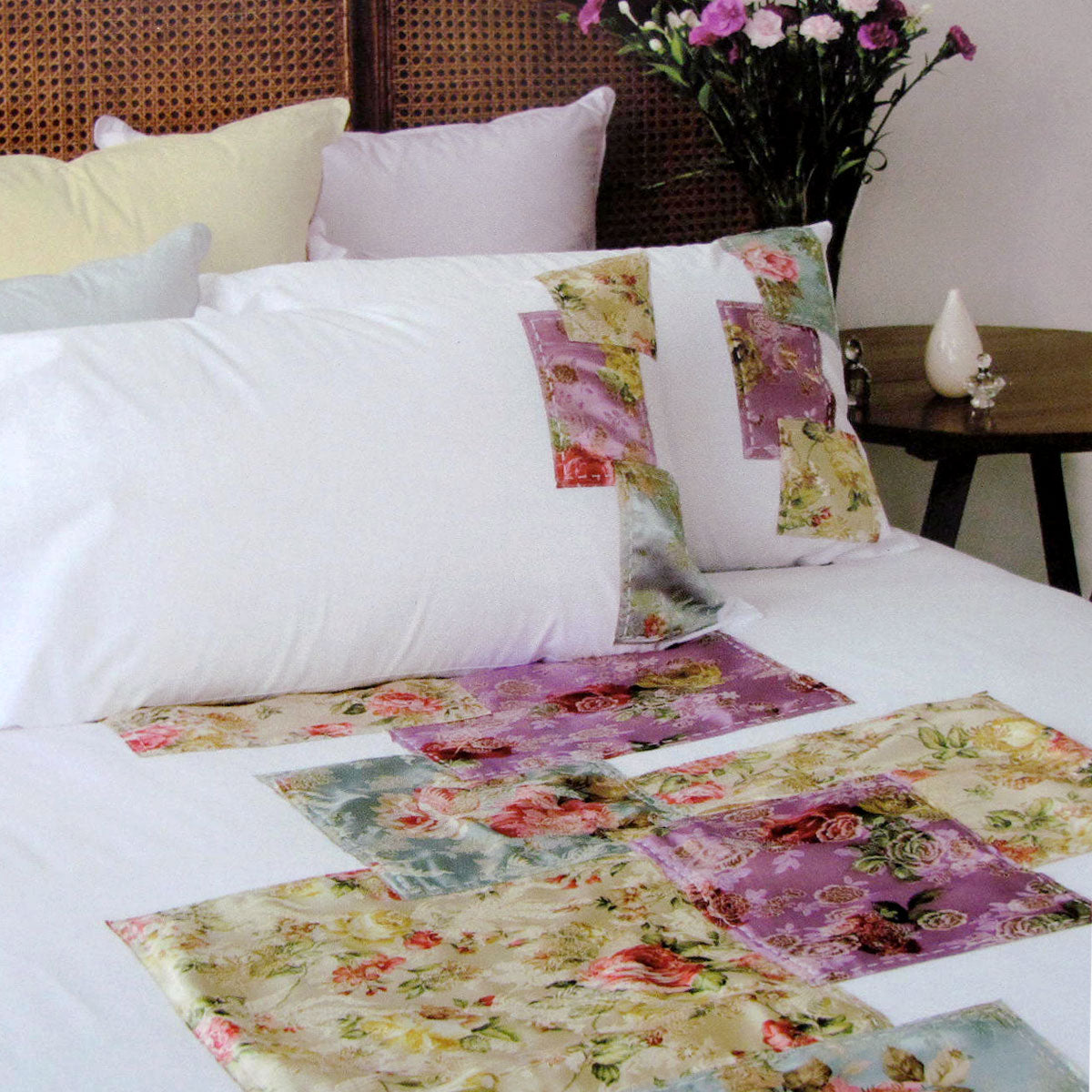 Accessorize Country Rose White Quilt Cover Set featuring floral patchwork design in vibrant colors, perfect for single beds.