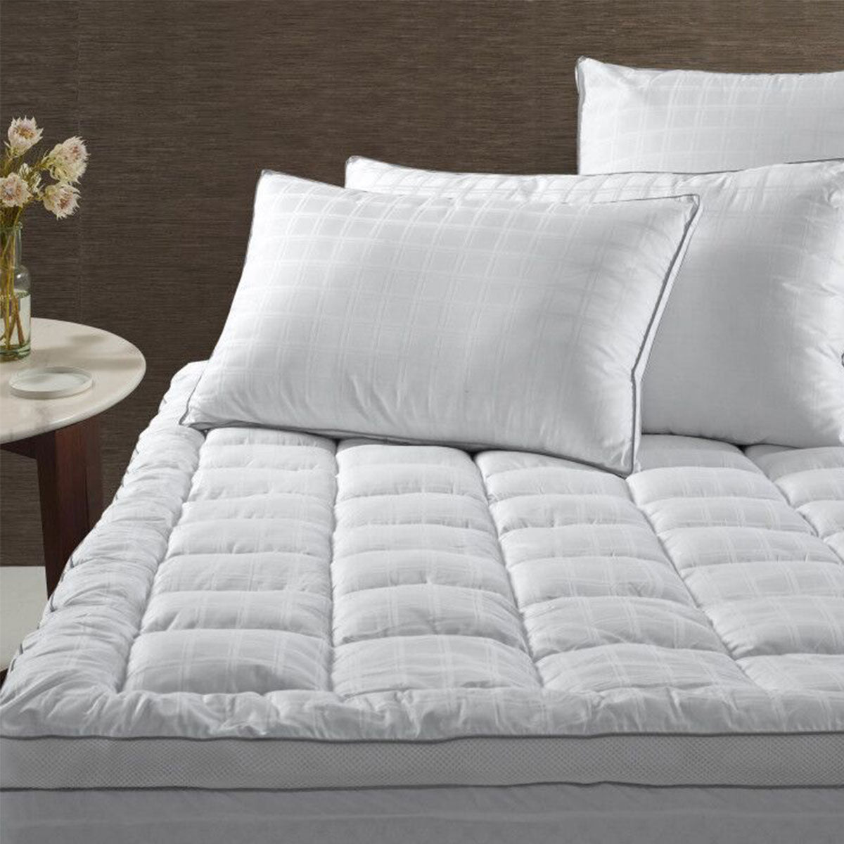 Accessorize Deluxe Hotel Mattress Topper King in solid white, showcasing soft cotton fabric and plush polyester filling.