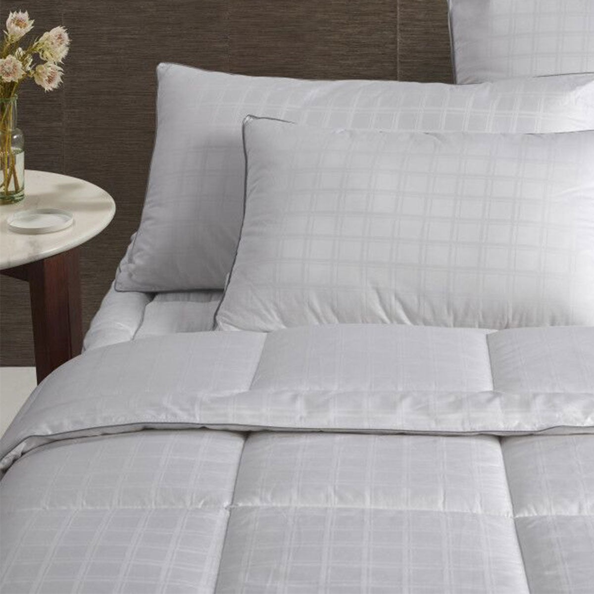 Accessorize Deluxe Hotel Quilt King in solid white, showcasing its soft cotton fabric and elegant design, perfect for a minimalist bedroom.