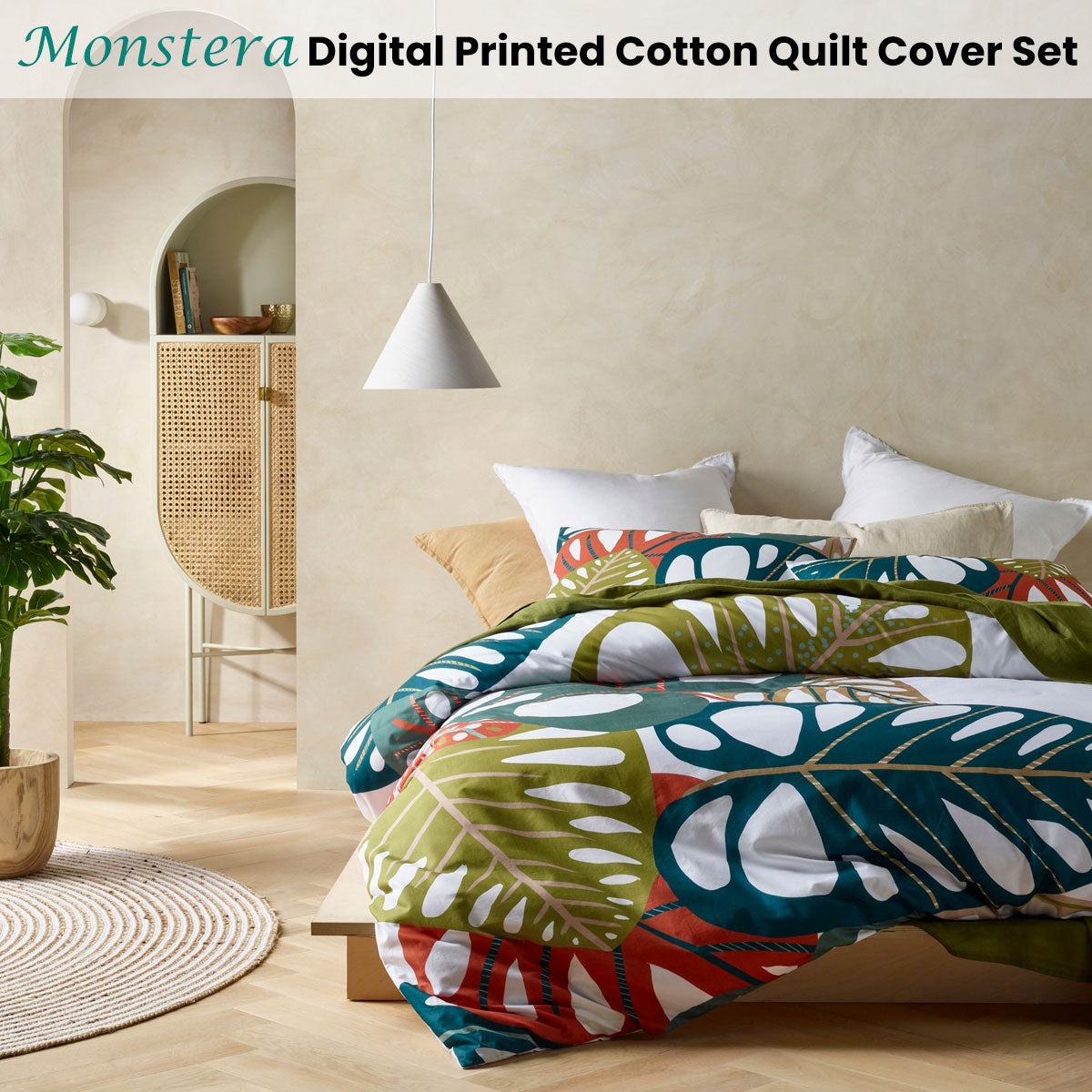 Accessorize Monstera Digital Printed Cotton Quilt Cover Set King featuring vibrant tropical leaves in teal, brown, and green hues.