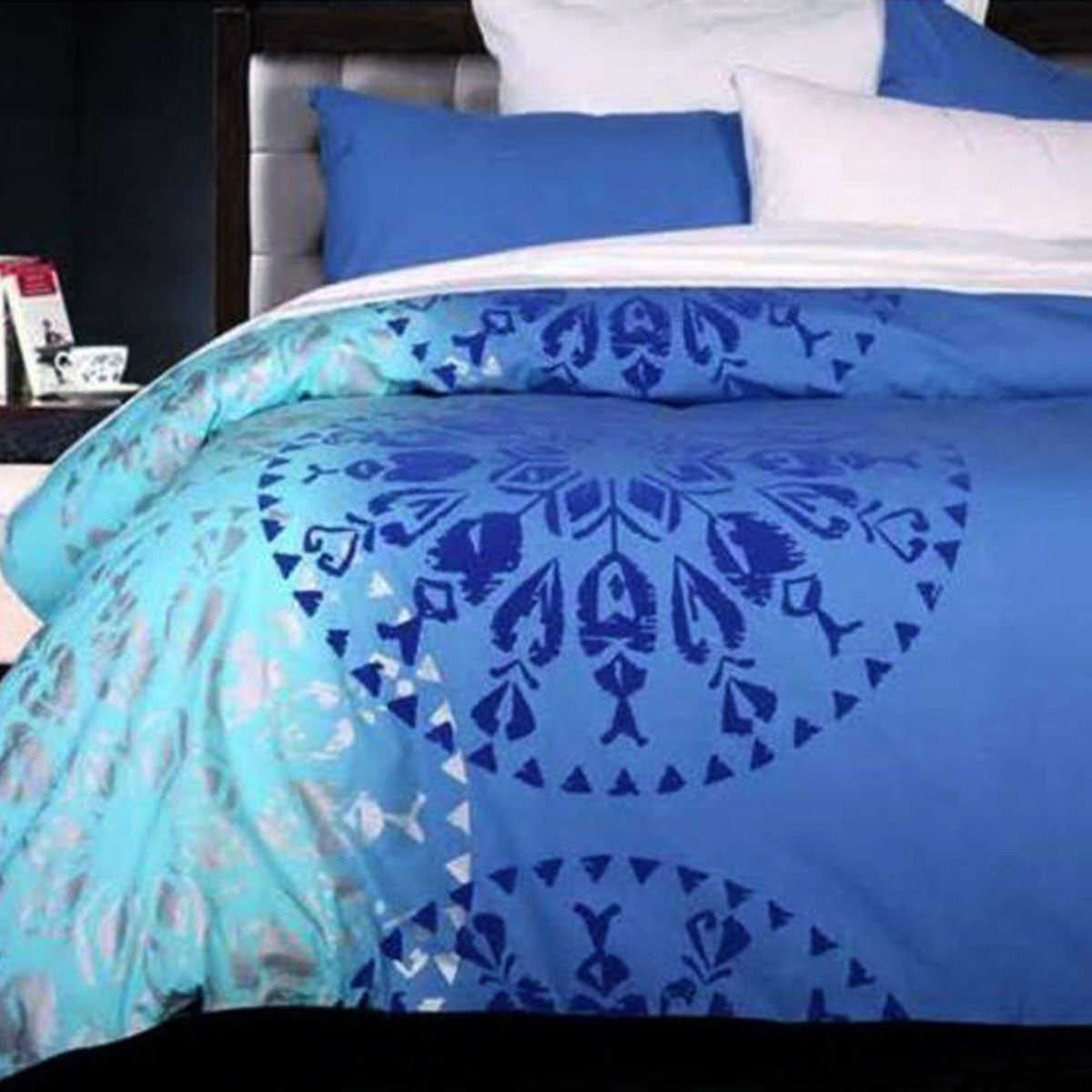 Accessorize Navajo Blue Quilt Cover Set Single featuring geometric patterns in blue, silver, aqua, and turquoise colors.