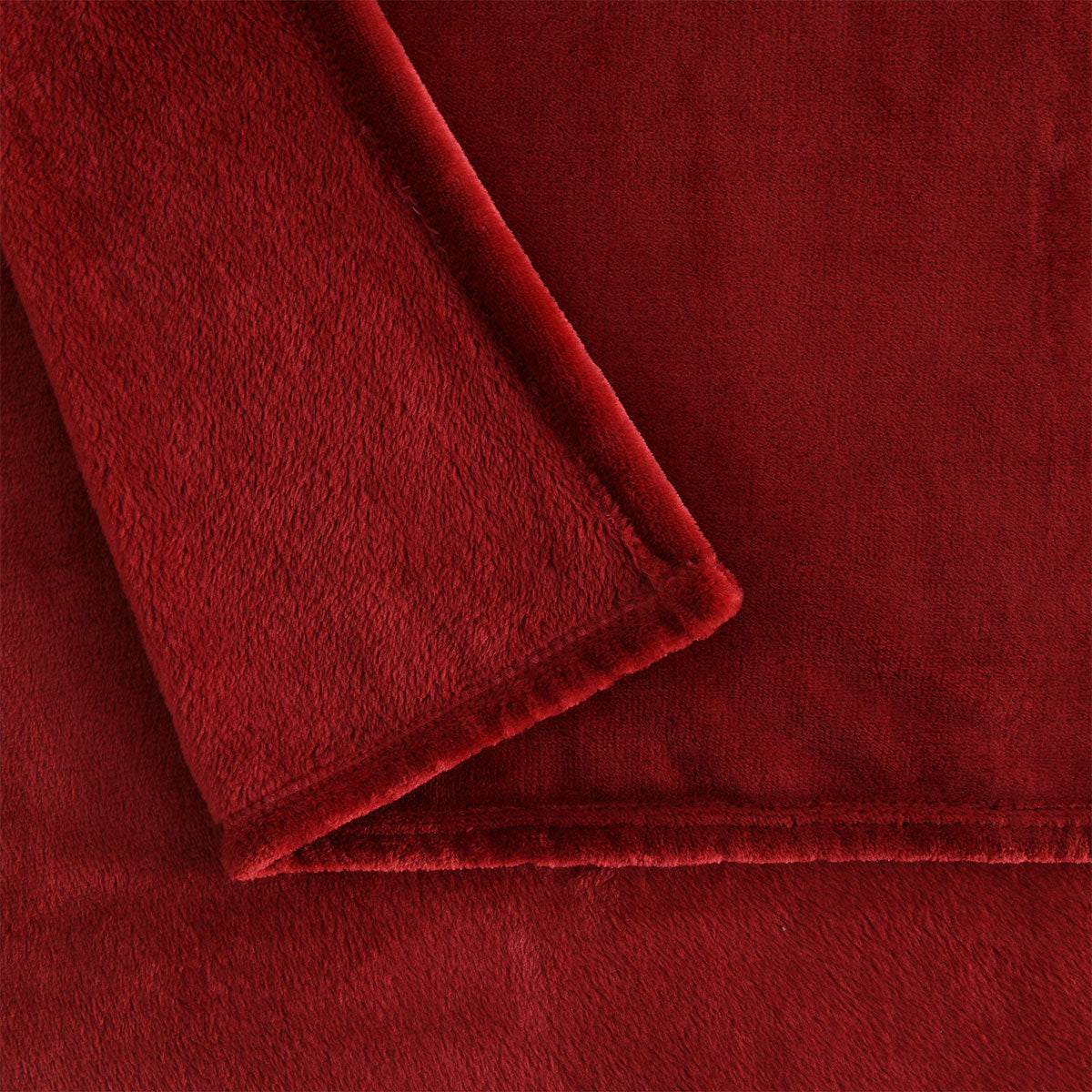 Accessorize Rouge Super Soft Blanket in elegant solid color, perfect for Queen or King beds, showcasing its plush texture and generous size.