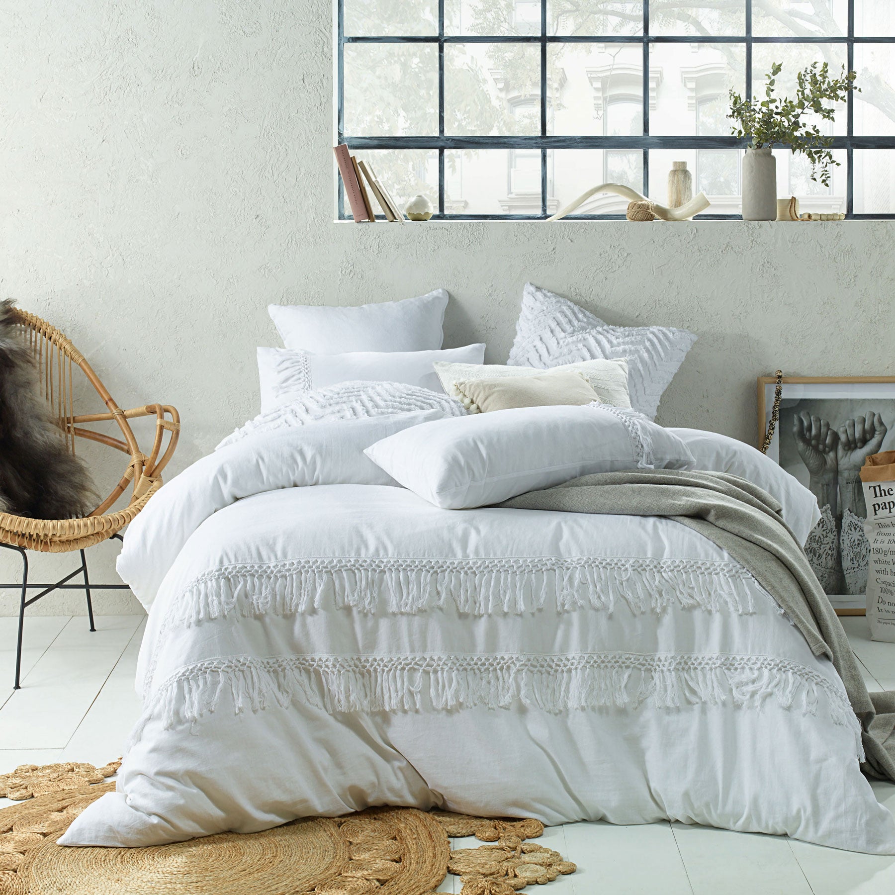 Accessorize Tassel Quilt Cover Set in White, featuring elegant appliqué patterns and soft linen cotton fabric, perfect for a king-sized bed.