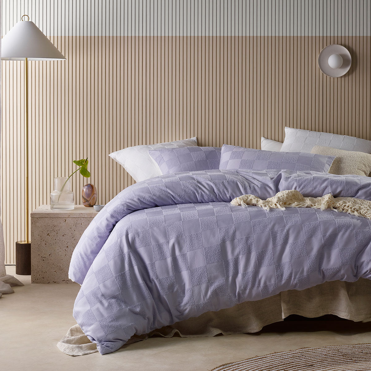 Accessorize Tipo Lilac Chenille Quilt Cover Set featuring a textured grid pattern, includes quilt cover and two pillowcases in a soft lilac color.