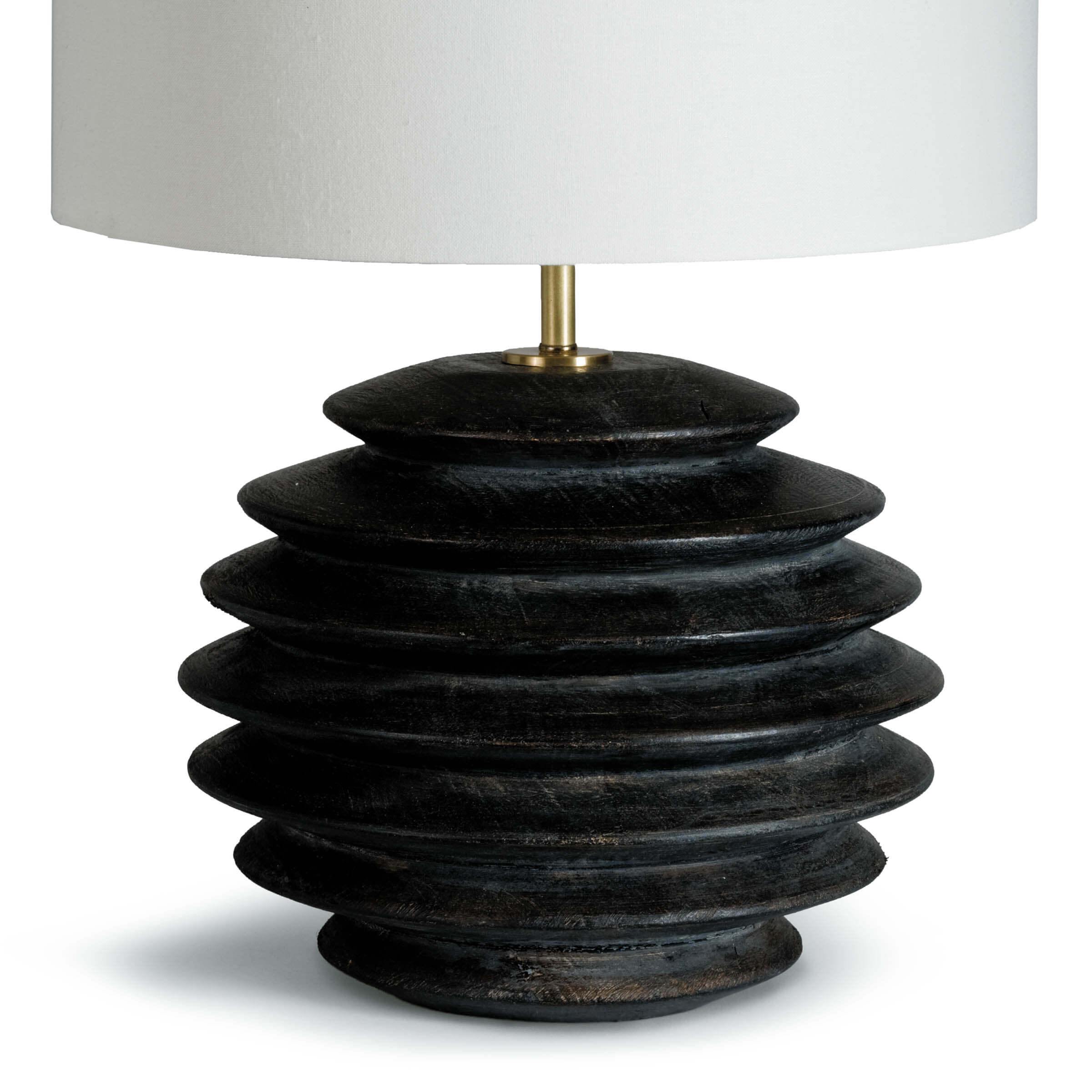 Accordion Table Lamp Round featuring a birch wood body with ebony finish and a white shade, showcasing its elegant design.