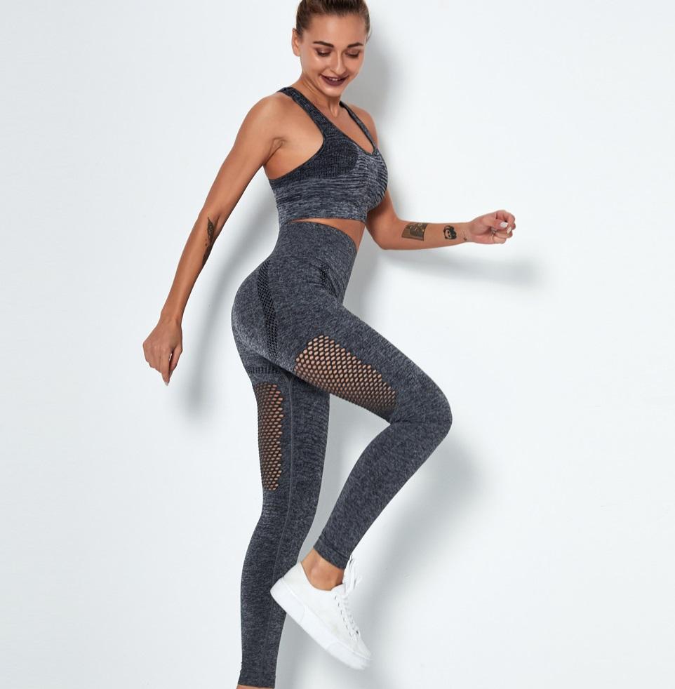 Women's cotton yoga suit tracksuit in pure color, featuring a sleeveless top and high-waisted ankle-length pants, perfect for gym and sports activities.