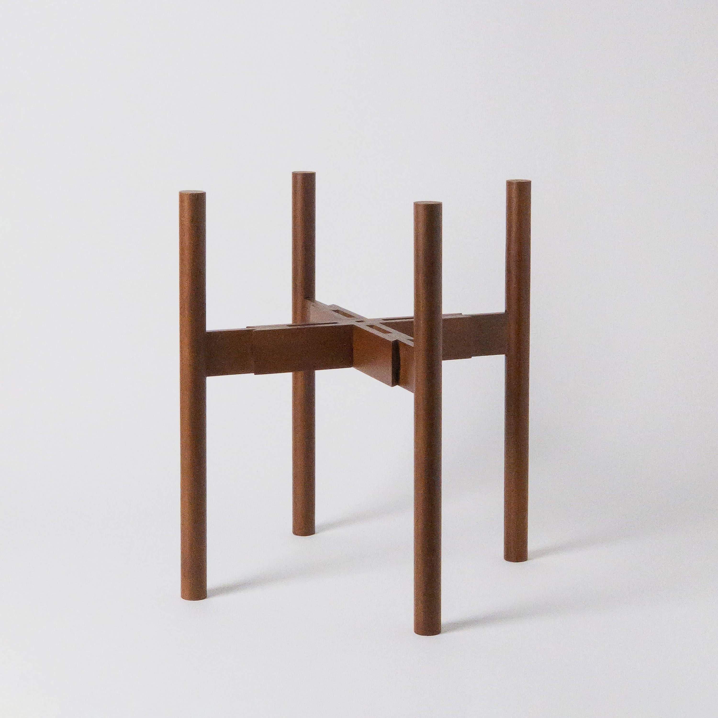 Adjustable Dark Bamboo Plant Stand showcasing two height options with a sleek design.