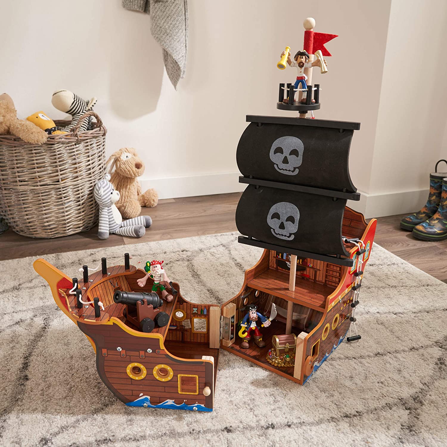 Adventure Bound Pirate Ship for kids, featuring a wooden design with interactive elements like a cannon that lights up and makes sounds.