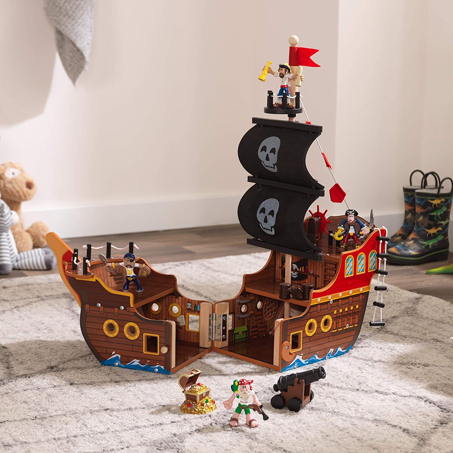 Adventure Bound Pirate Ship for kids, featuring a wooden design with interactive elements like a cannon that lights up and makes sounds.