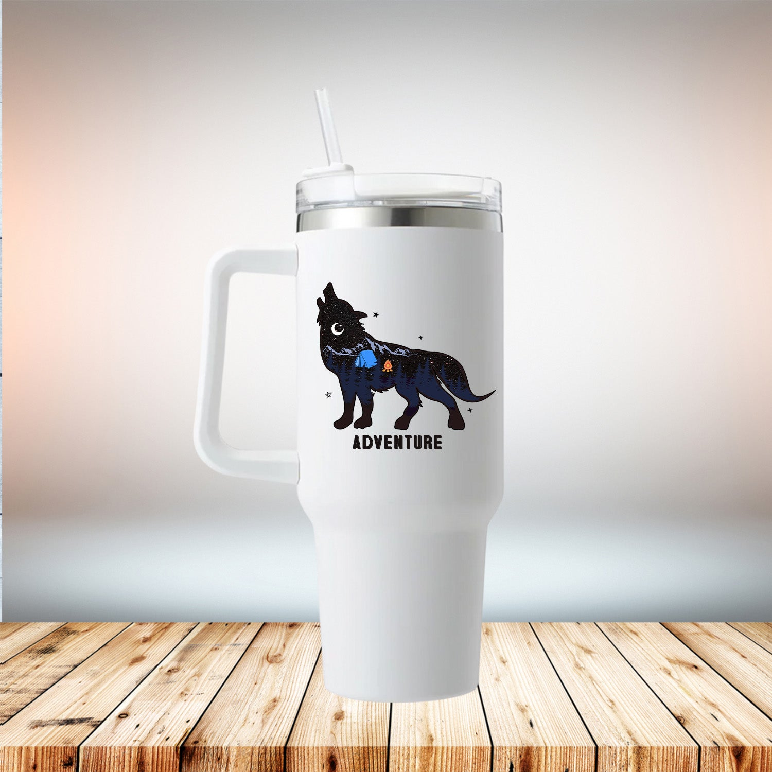 Adventure Wolf 40oz Travel Mug in white stainless steel with removable handle and straw lid.