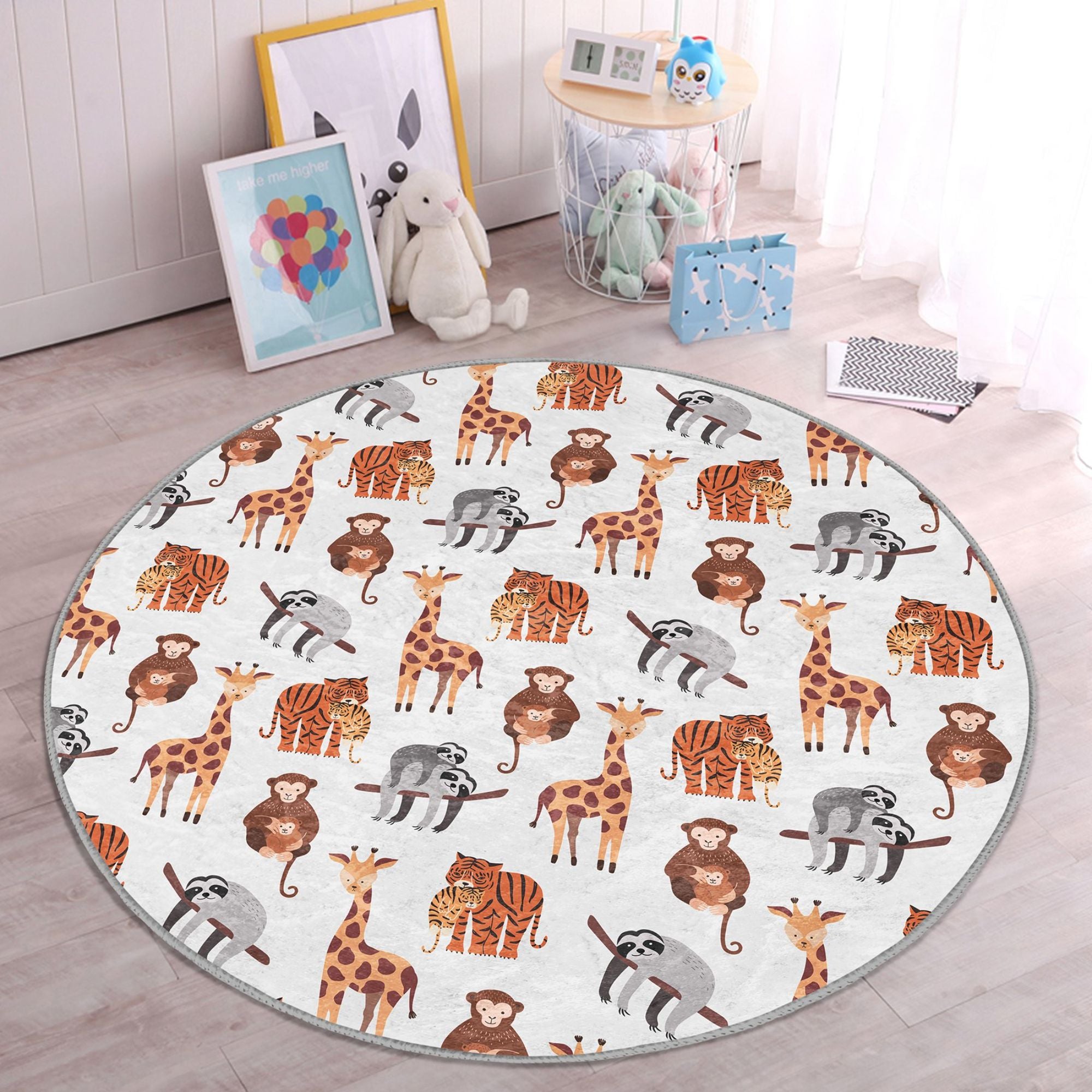 A colorful kids washable rug featuring various African animals, designed for comfort and style in children's rooms.