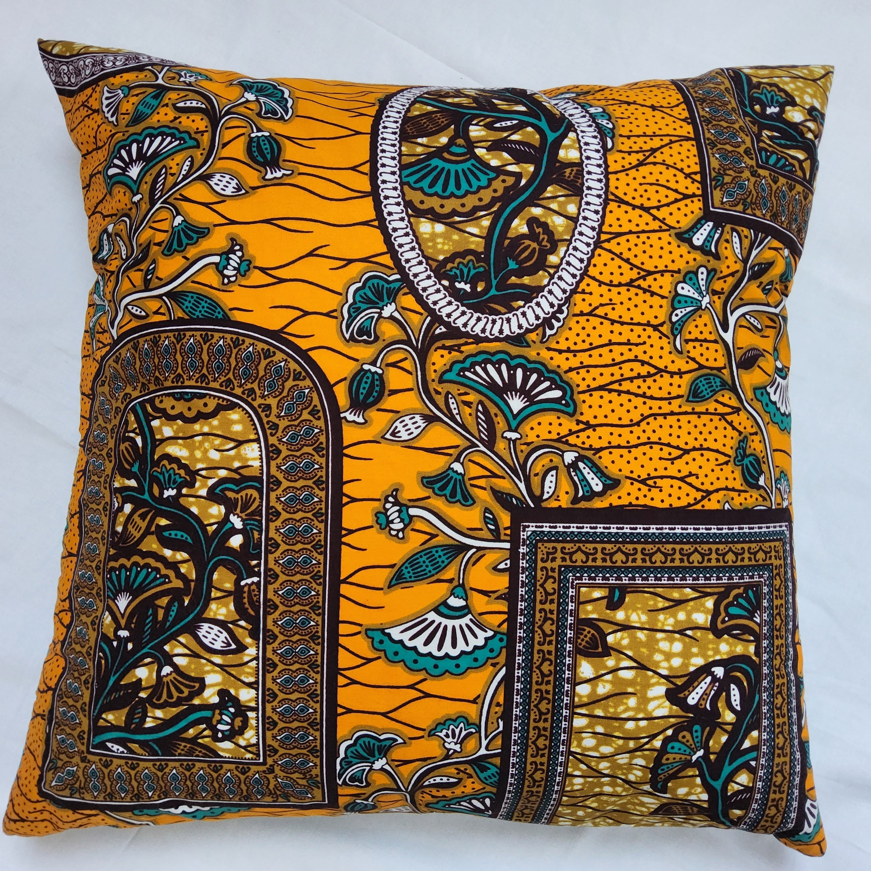 AfroBrit Fusion 50x50cm square cushion featuring vibrant Ankara fabric and luxurious velvet finish, perfect for home decor.