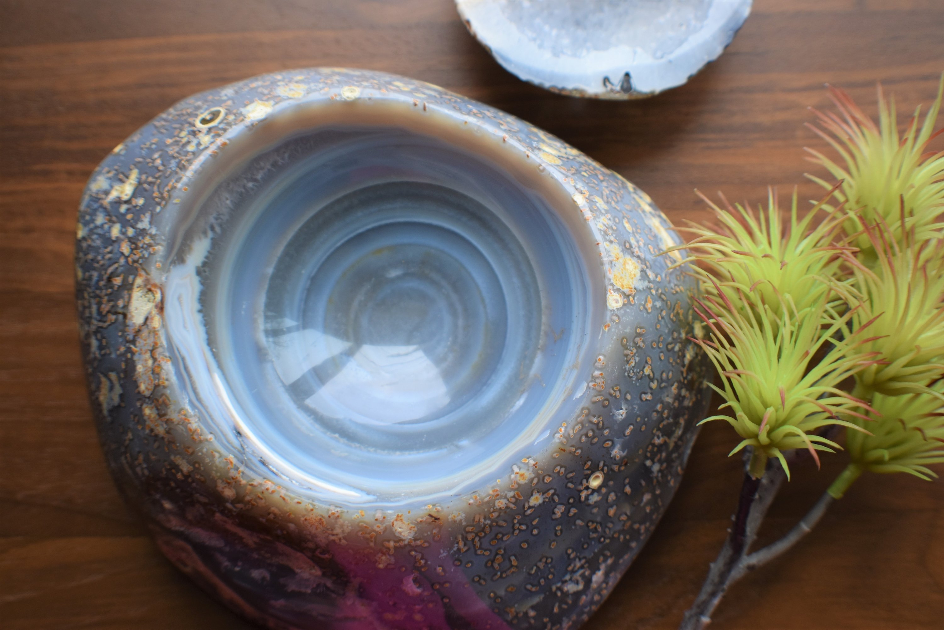 A beautifully crafted agate bowl showcasing unique natural patterns and colors, perfect for home decor.