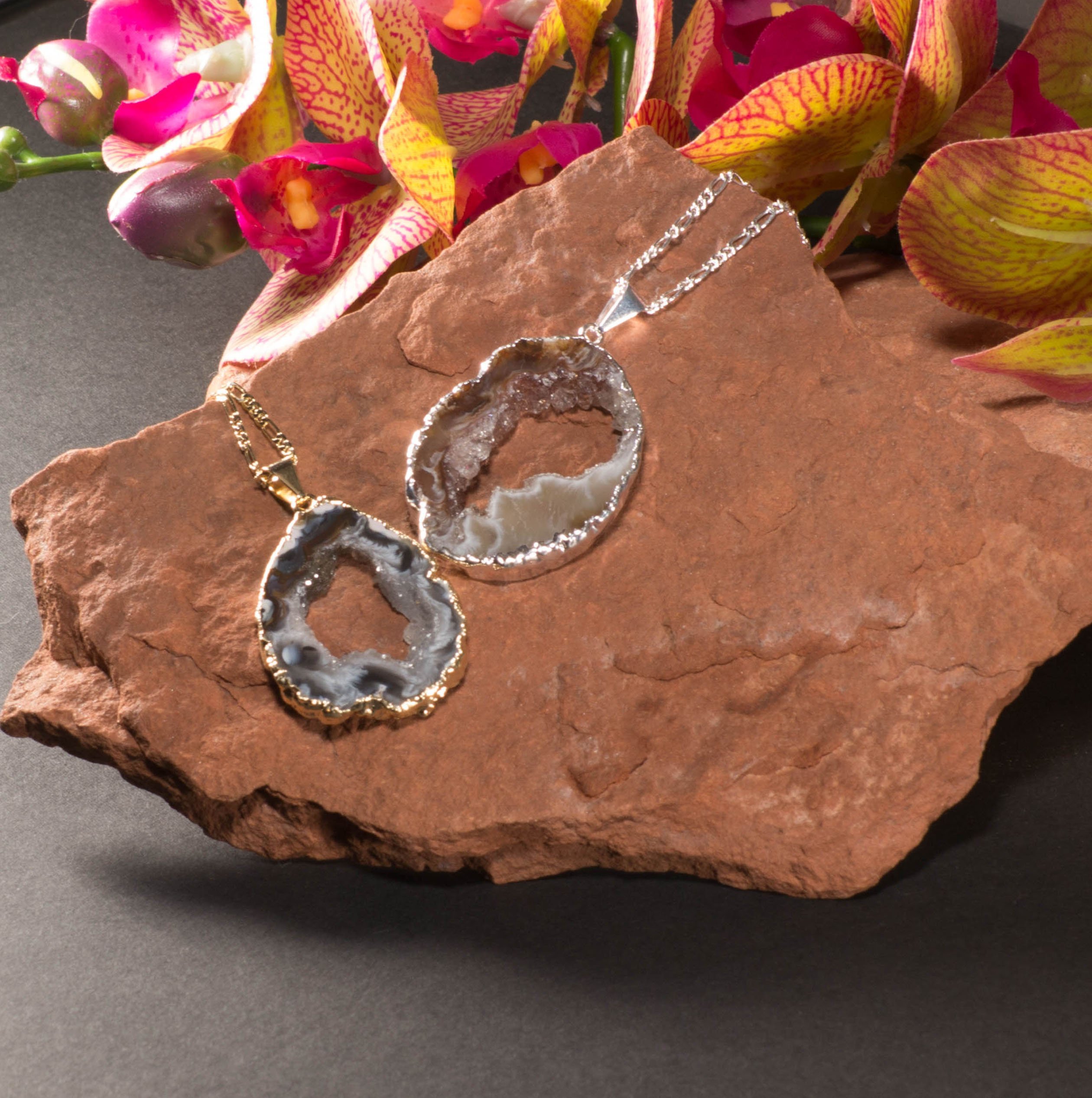 Agate Geode Chain Necklace featuring a sparkling agate geode pendant with gold or silver trim on a delicate chain.