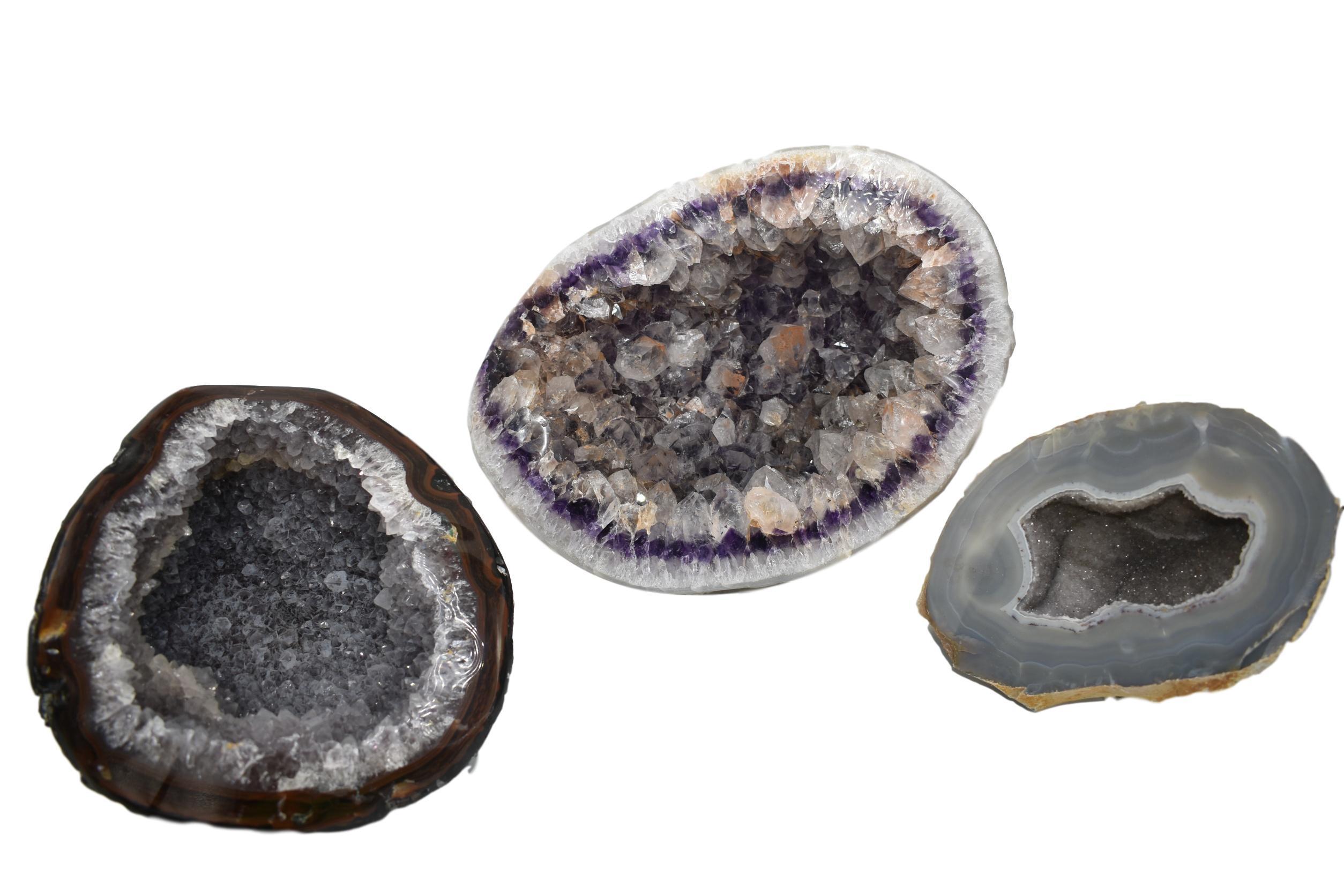 A collection of unique Agate Geode Free Forms in various sizes showcasing sparkling internal structures.