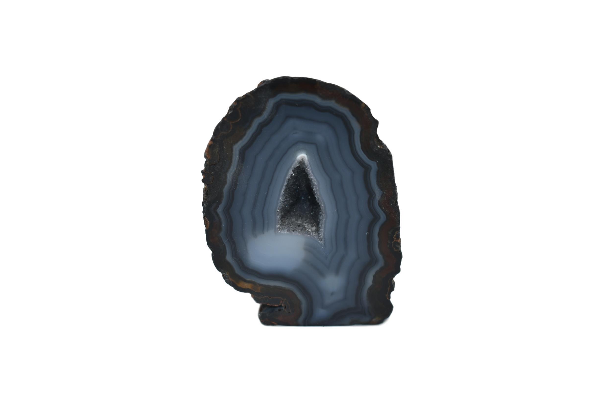 A collection of small, medium, and large agate geodes showcasing vibrant colors and unique crystal formations, perfect for home decoration.