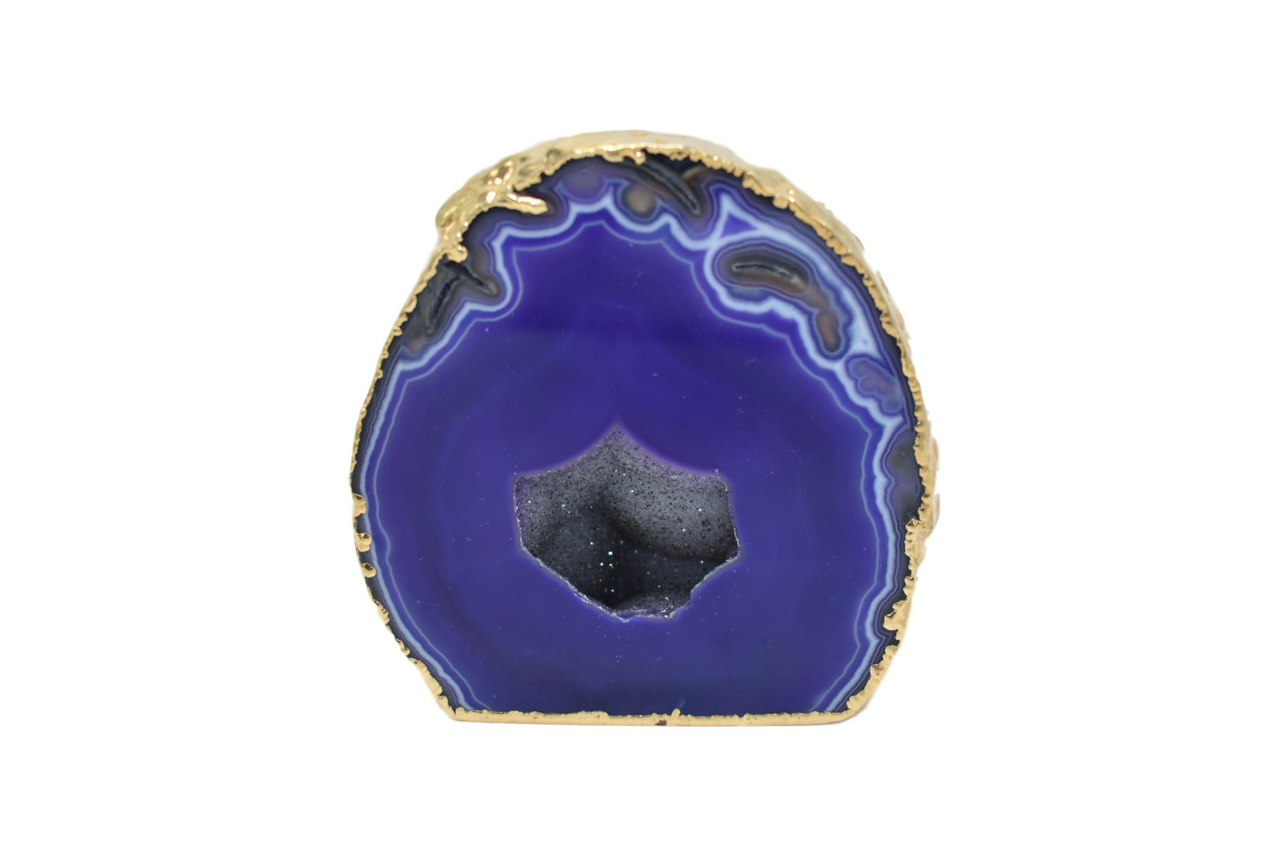 Colorful agate geodes with gold and silver electroplating, showcasing unique patterns and vibrant hues, perfect for home decor.