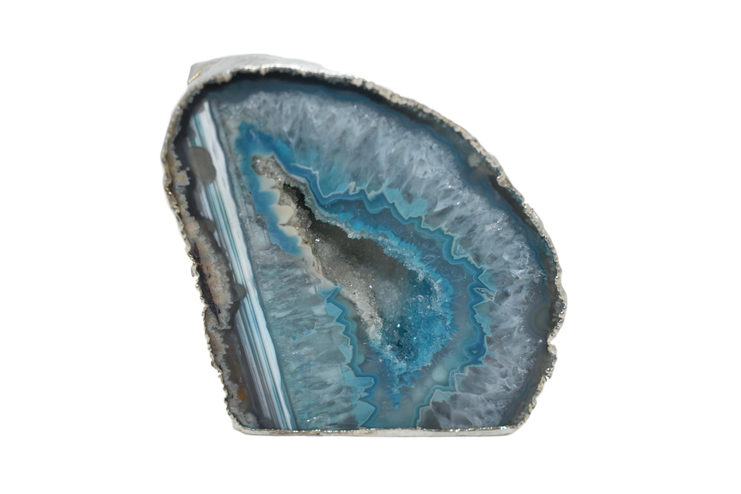 Colorful agate geodes with gold and silver electroplating, showcasing unique patterns and vibrant hues, perfect for home decor.