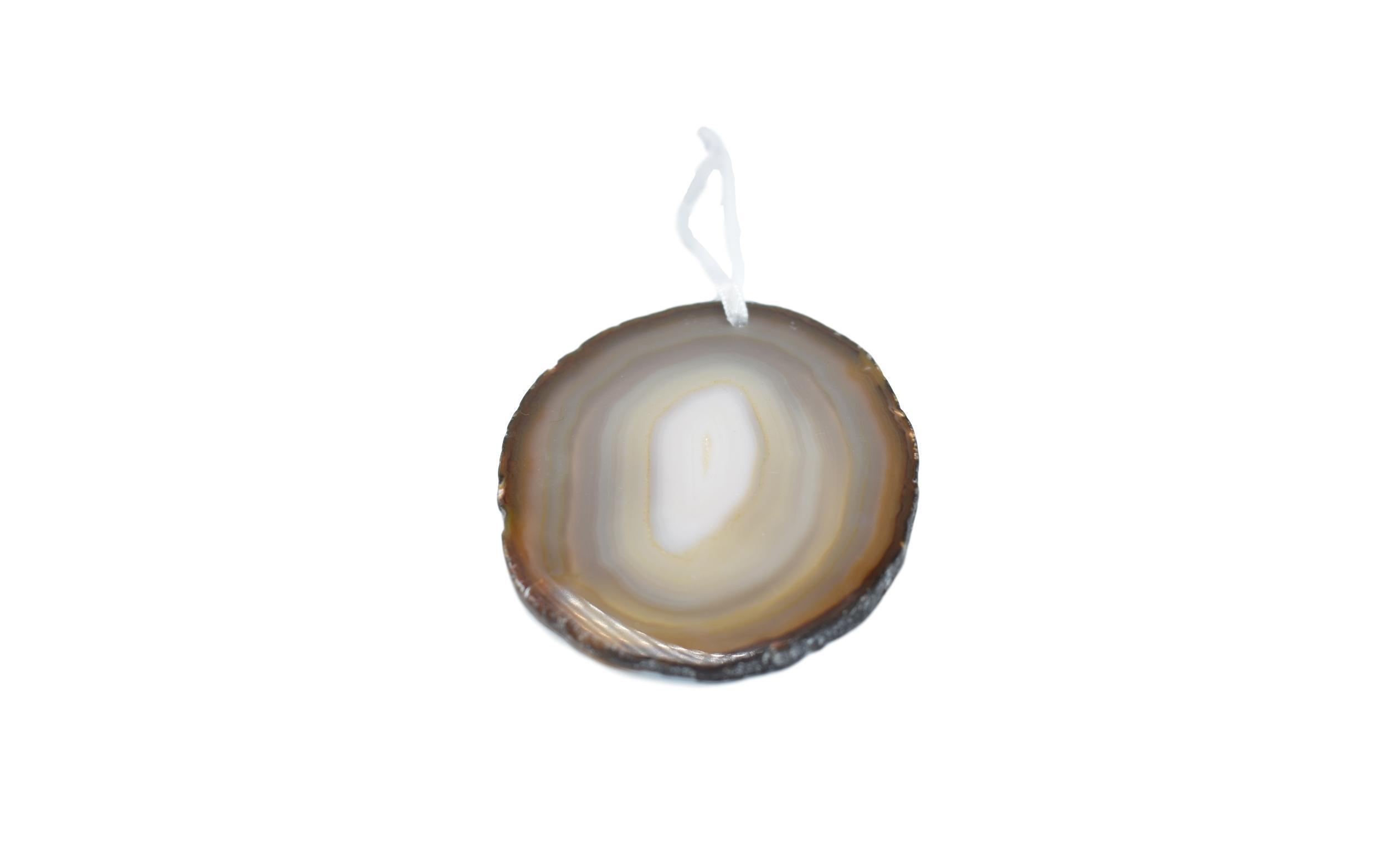 A beautiful agate ornament with a polished natural trim, hanging from a white silk ribbon, showcasing its unique colors and patterns.