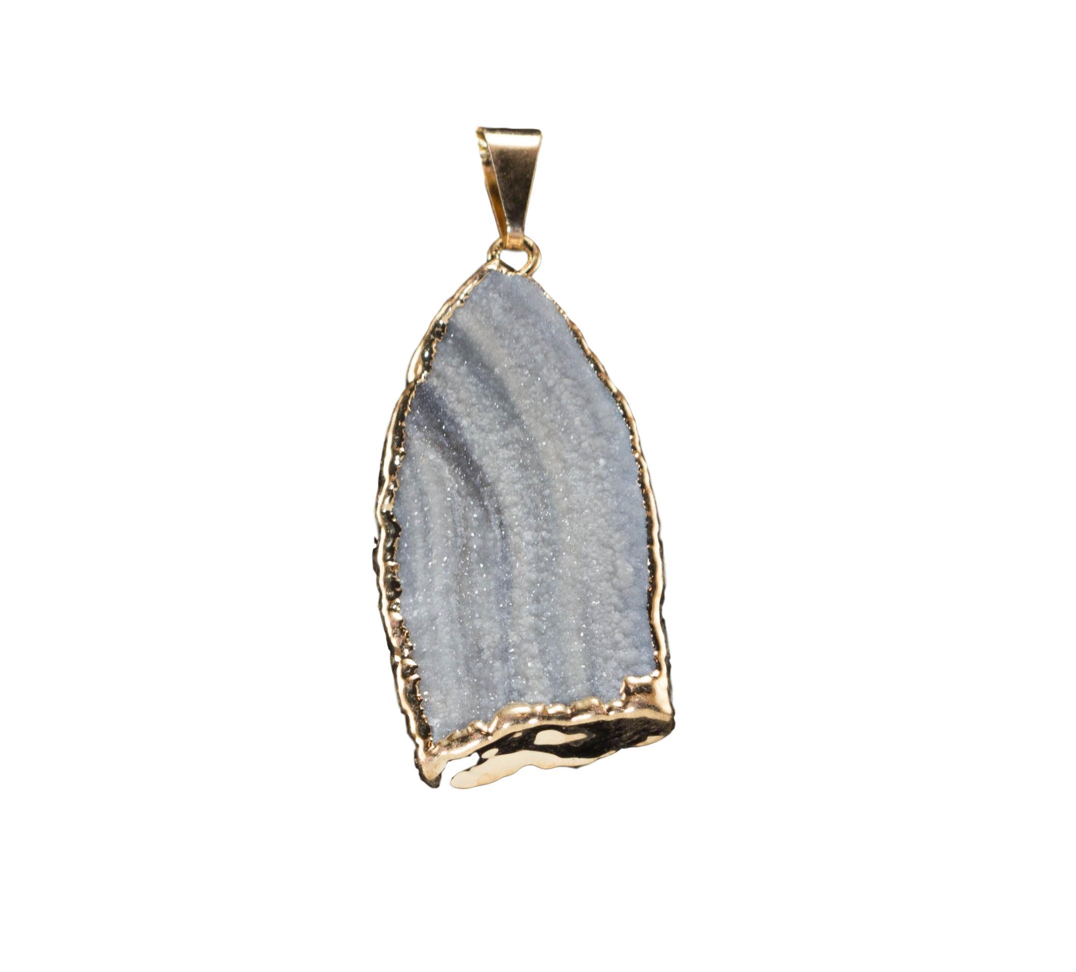 A collection of elegant agate sculpture pendants in various designs, including leaf, heart, and dolphin, trimmed in silver and gold.