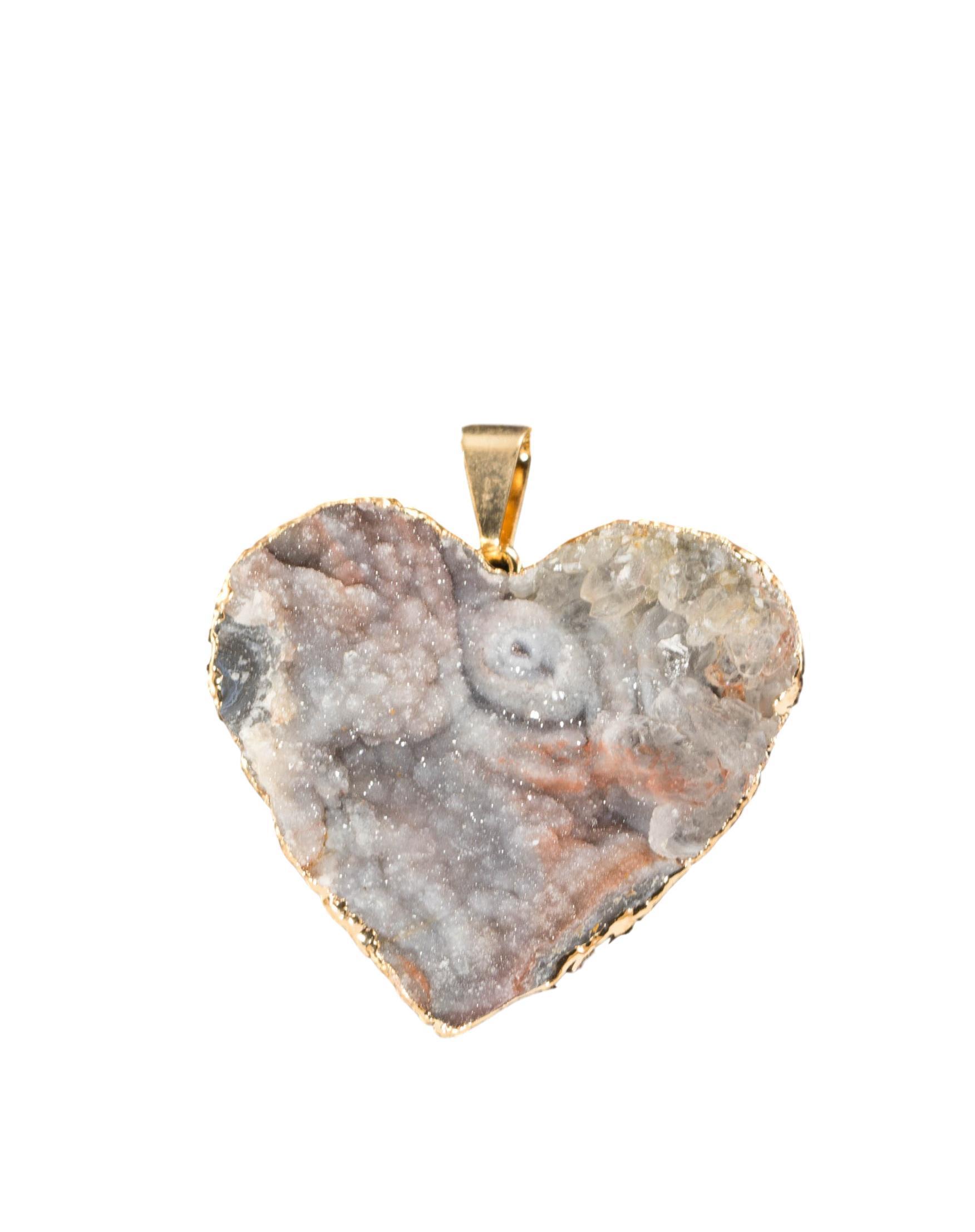 A collection of elegant agate sculpture pendants in various designs, including leaf, heart, and dolphin, trimmed in silver and gold.