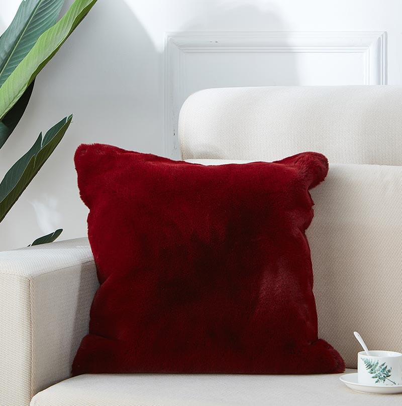 Agnes Luxury Red Chinchilla Faux Fur Pillow showcasing plush red faux fur with a contemporary square design and a zippered velvet back.