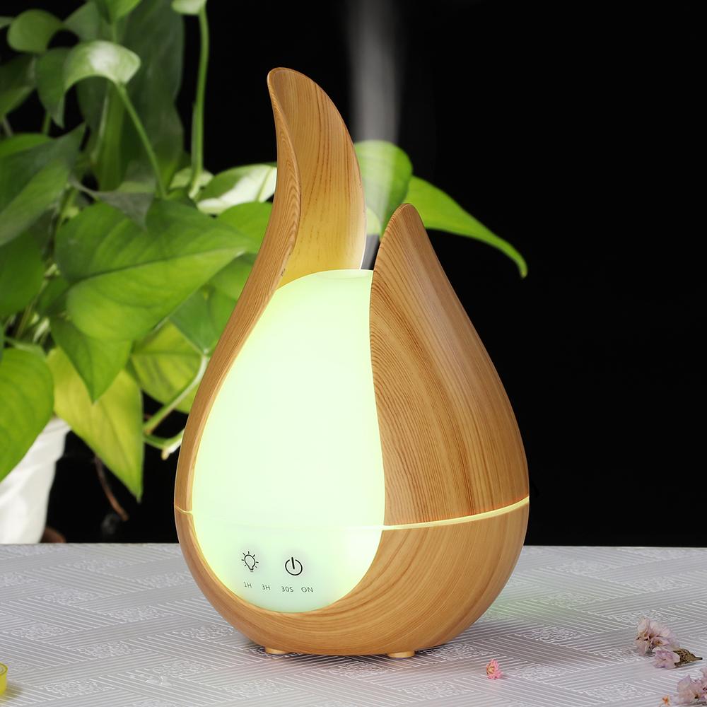 Air Humidifier Aroma Essential Oil Diffuser with 7 colors LED night light, designed for healthy air and relaxation.