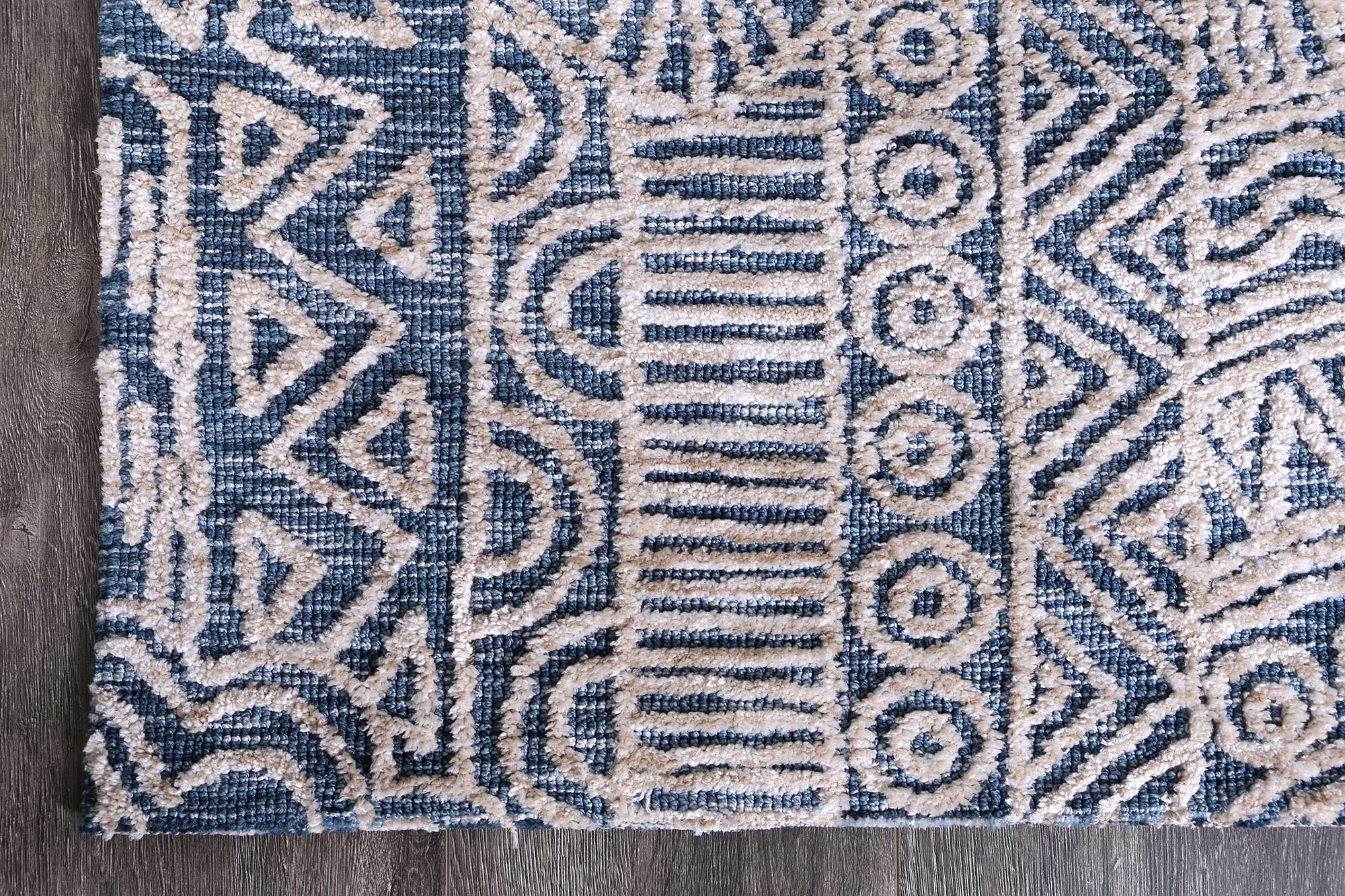 Alayah Navy Flower Rug 160x230 cm featuring geometric patterns in warm colors, hand-tufted wool construction for luxury and comfort.